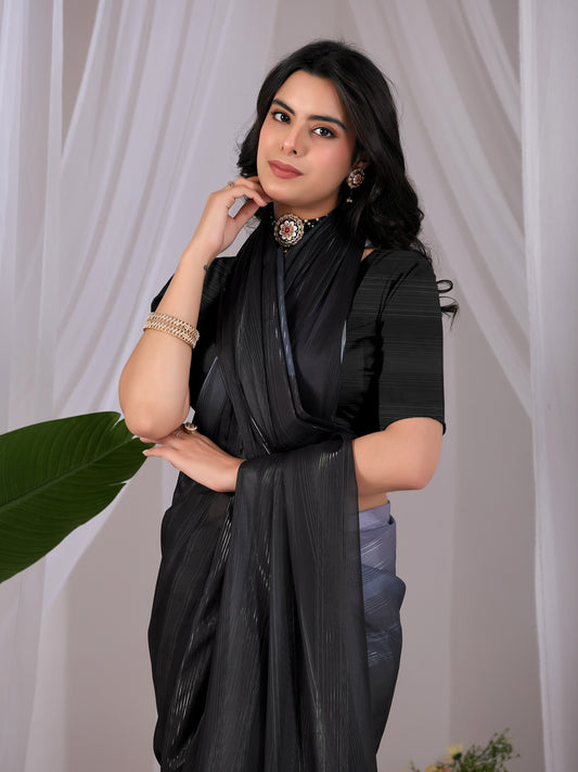 Premium Monsoon Saree featuring a classy ombré blend of deep black and smoky grey tones with a silky smooth flow of saree