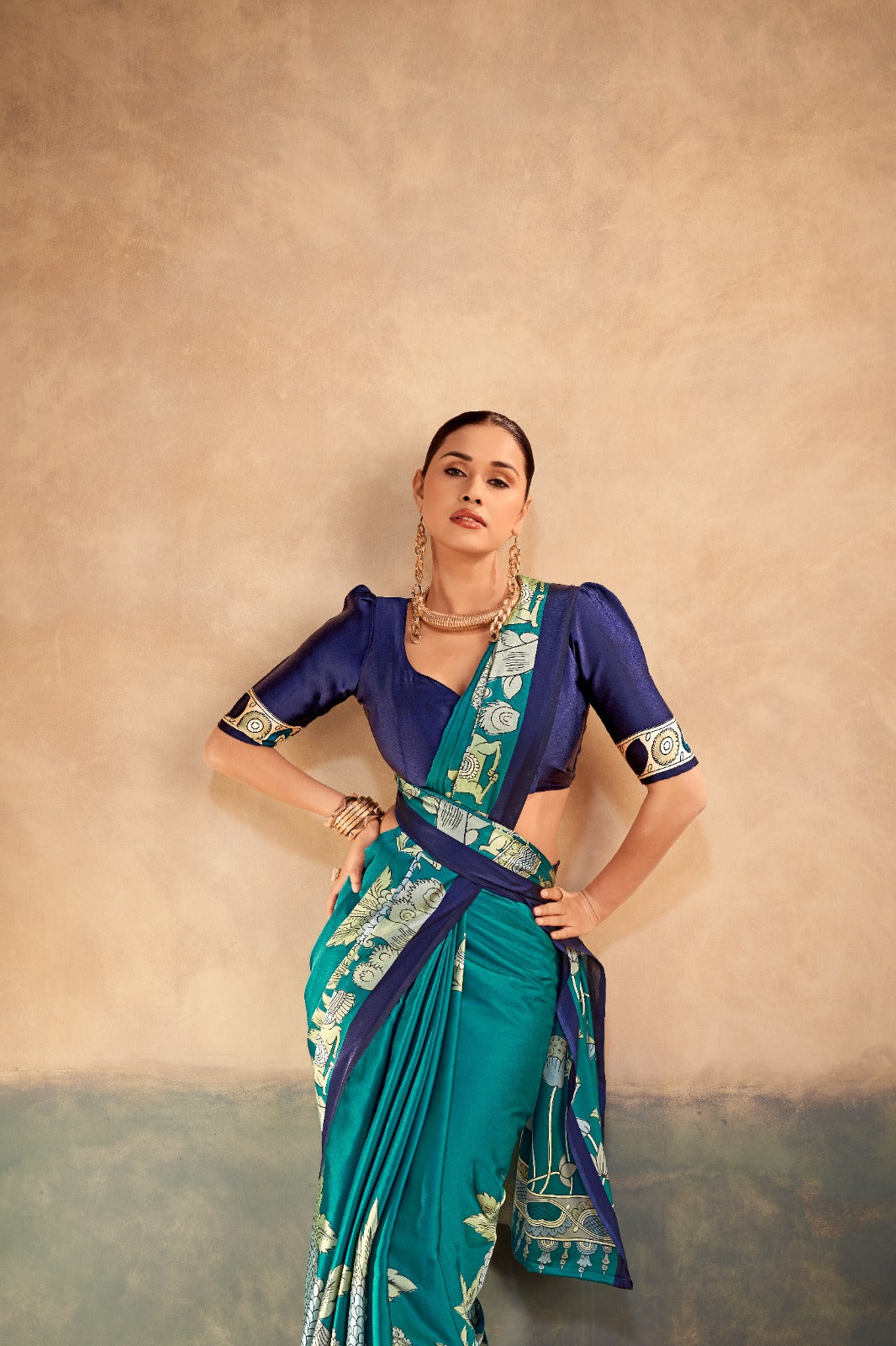 The beauty of Kalamkari art paired with the softness of satin silk creates a saree that feels luxurious, graceful, and timeless.