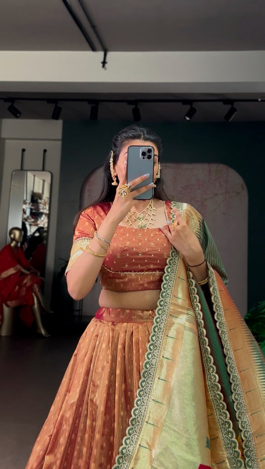 This shimmer organza lehenga choli adorned with zari weaving and delicate lace borders brings timeless elegance to every festive moment β¨