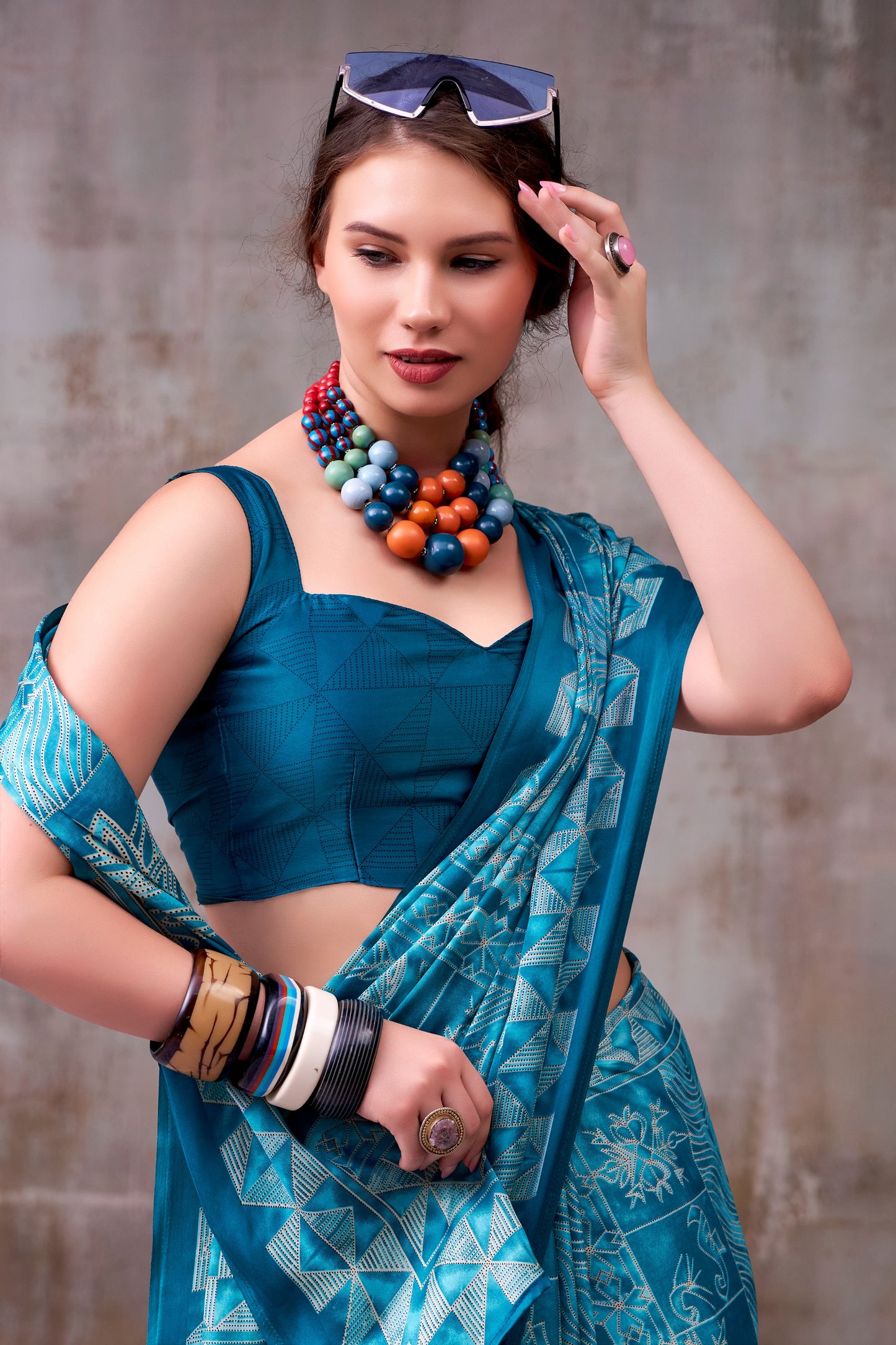Elegance defined — draped in timeless grace with a floral & geometric printed saree that speaks style in every fold.🪷