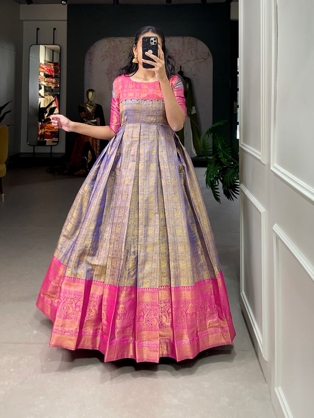 A joyful festive mood with Kanjivaram and zari weaving work appliqued gown 🌼