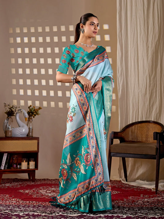 Soft Lichi Silk Saree with elegant floral print in soothing sky blue shades and a rich woven border