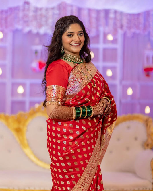 Silk Saree from the this store is adorned with beautiful Zari work in form of traditional motifs.