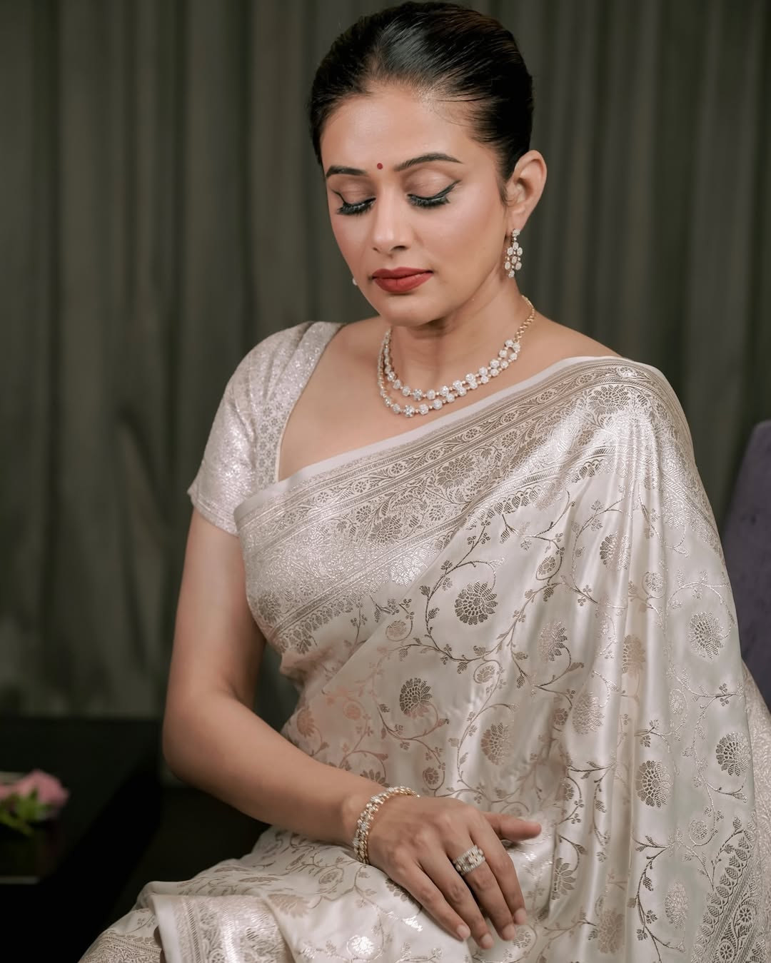Silk Saree from the this store is adorned with beautiful Zari work in form of traditional motifs