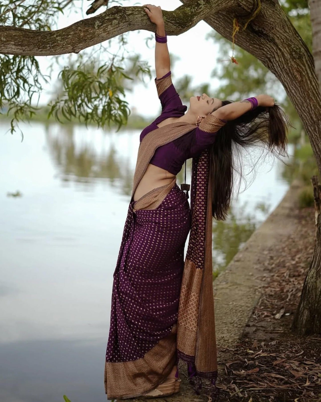 Silk Saree from the this store is adorned with beautiful Zari work in form of traditional motifs.
