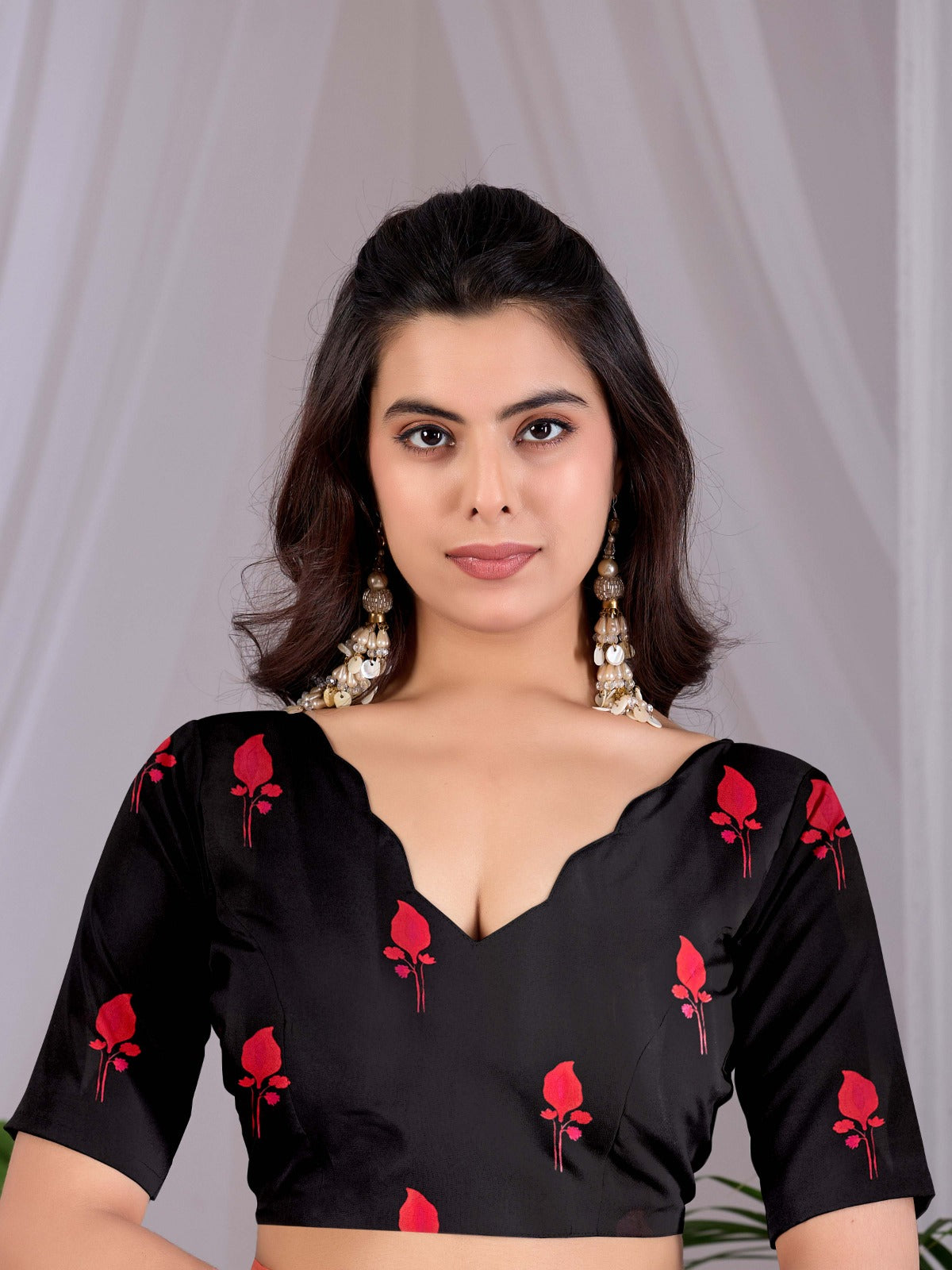 Contemporary Jet Black Festive Saree with Contrast Pink and Coral Floral Pallu Details