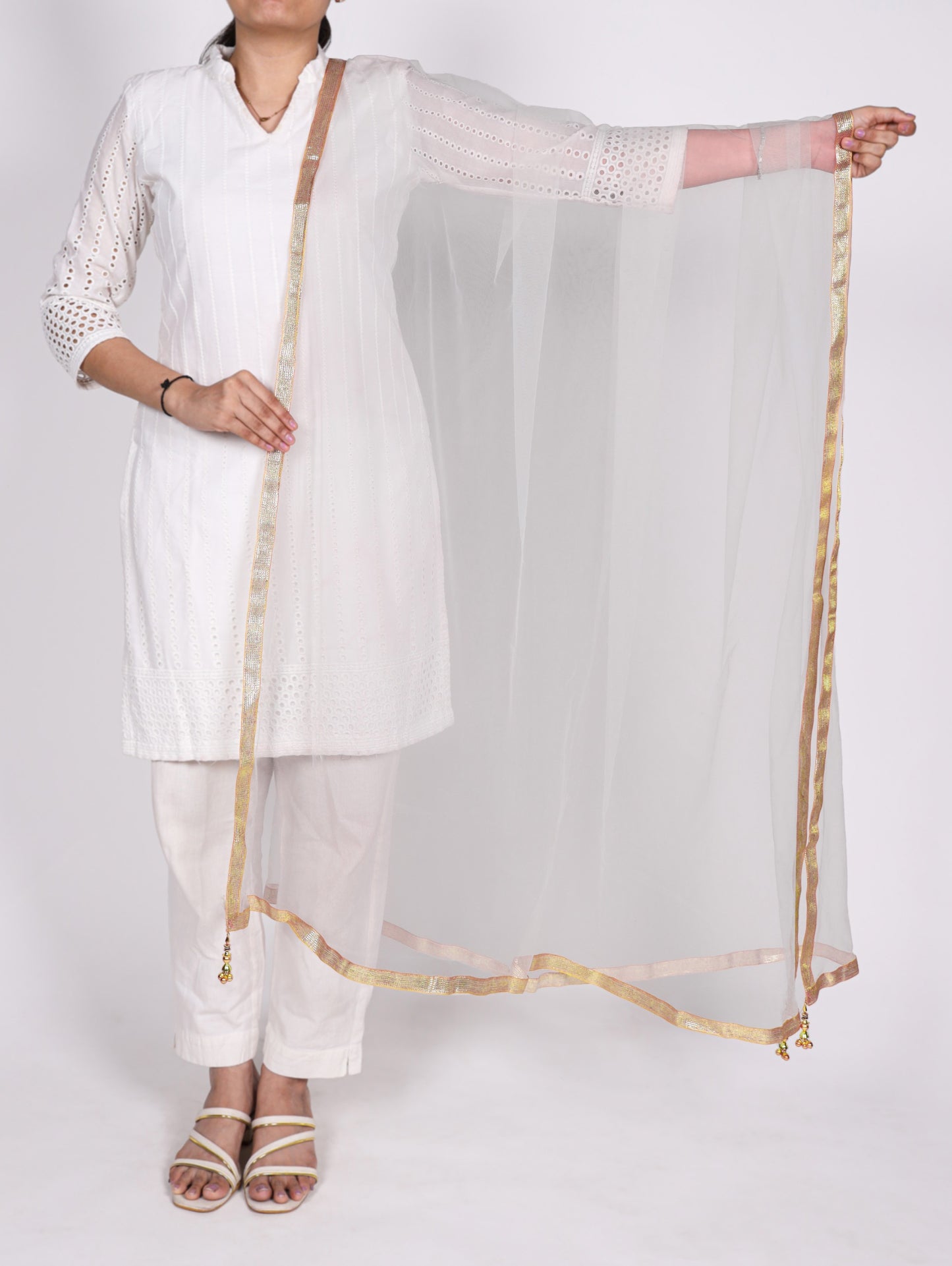 Grace enhanced with a delicate net dupatta. 💫