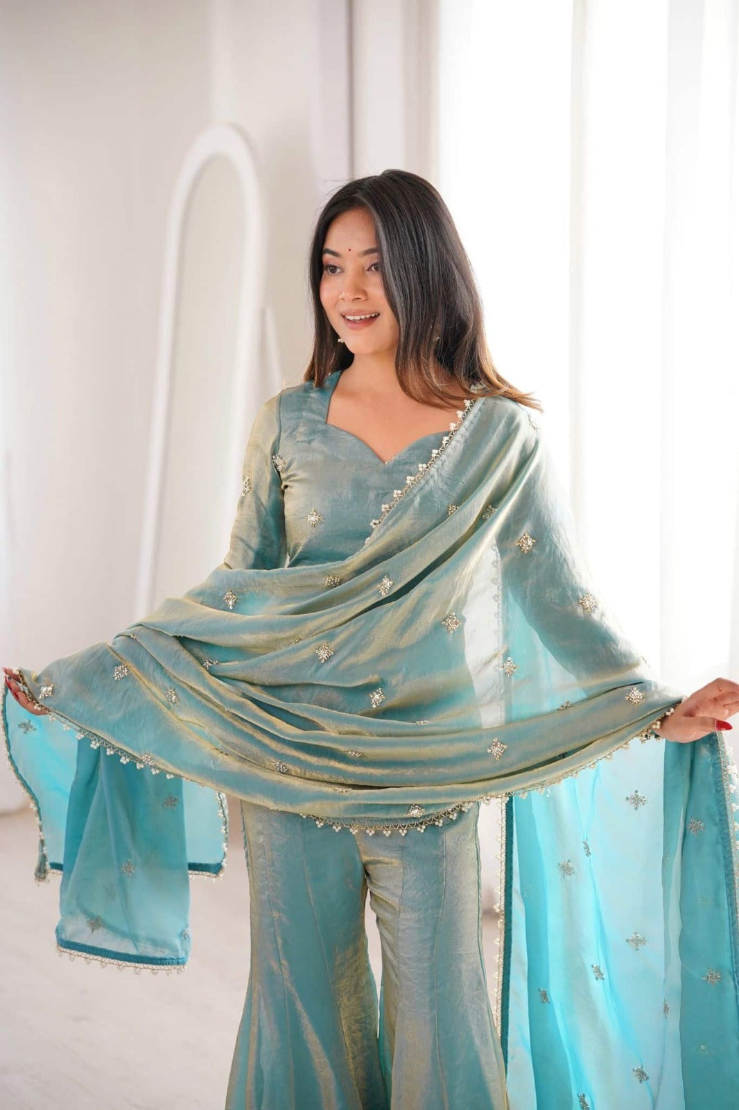 Elegant Sea Green Dual-Tone Silk Sharara Suit Set featuring a Short Sweetheart-Neck Kurti with Delicate Booti Embroidery and a Matching Sheer Dupatta