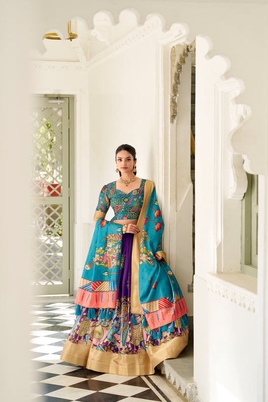 Adorned in the elegance of Dola Silk and the intricate charm of Kalamkari prints, the lehenga choli whispers tales of tradition and beauty💐.