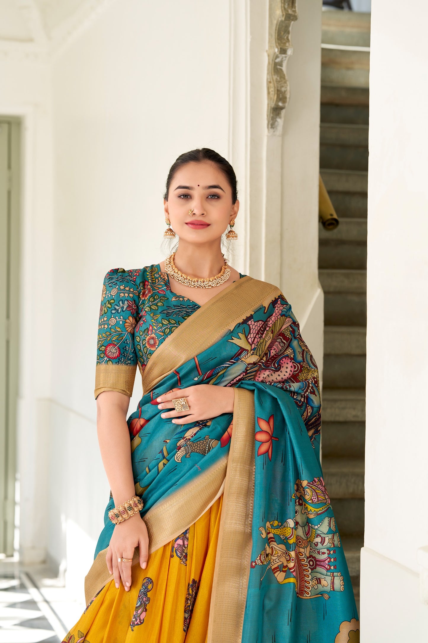 Adorned in the elegance of Dola Silk and the intricate charm of Kalamkari prints, the lehenga choli whispers tales of tradition and beauty💐.