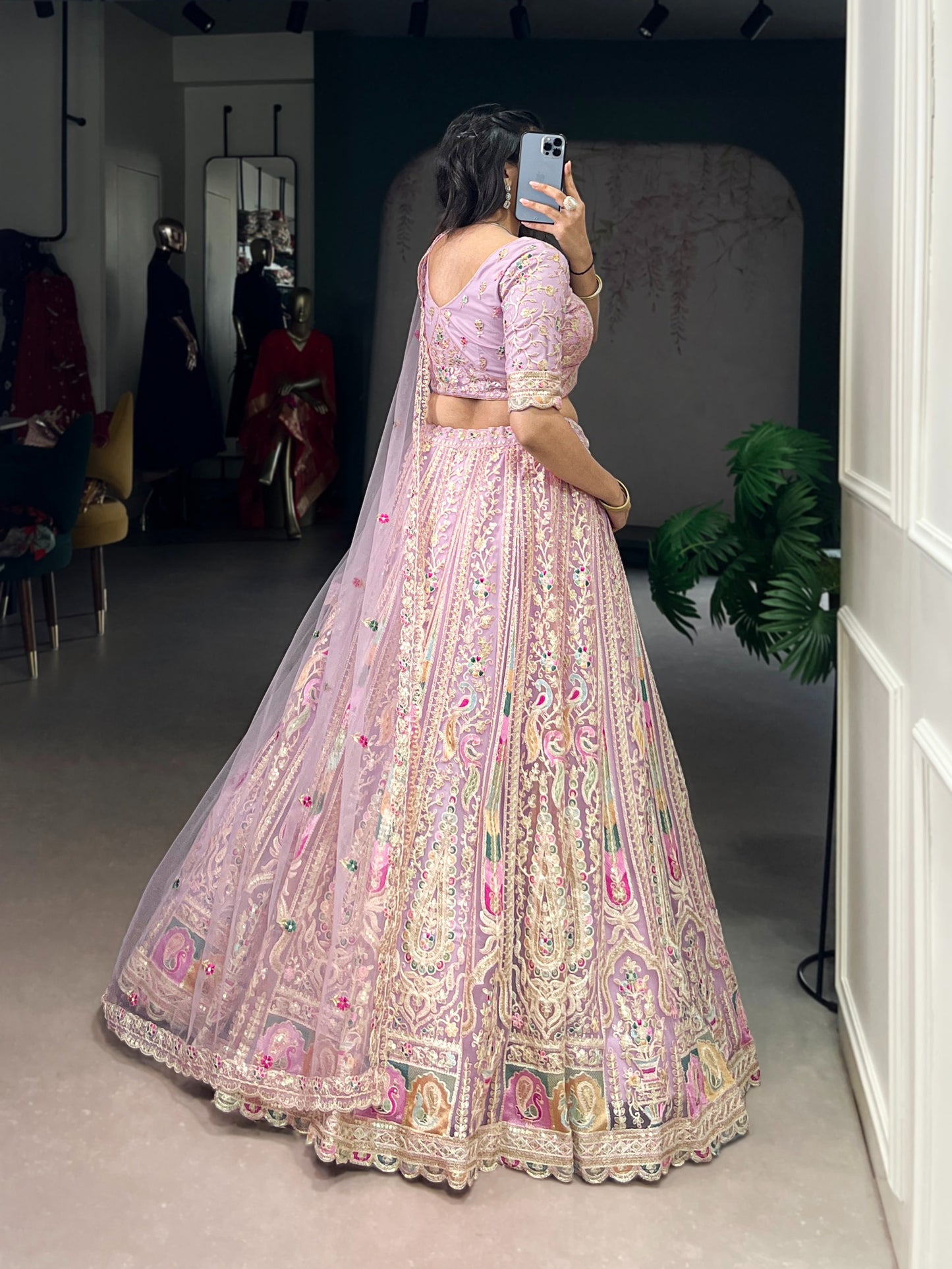 Women's Lehenga Choli in Lavender Net with Sequins and Thread Embroidery