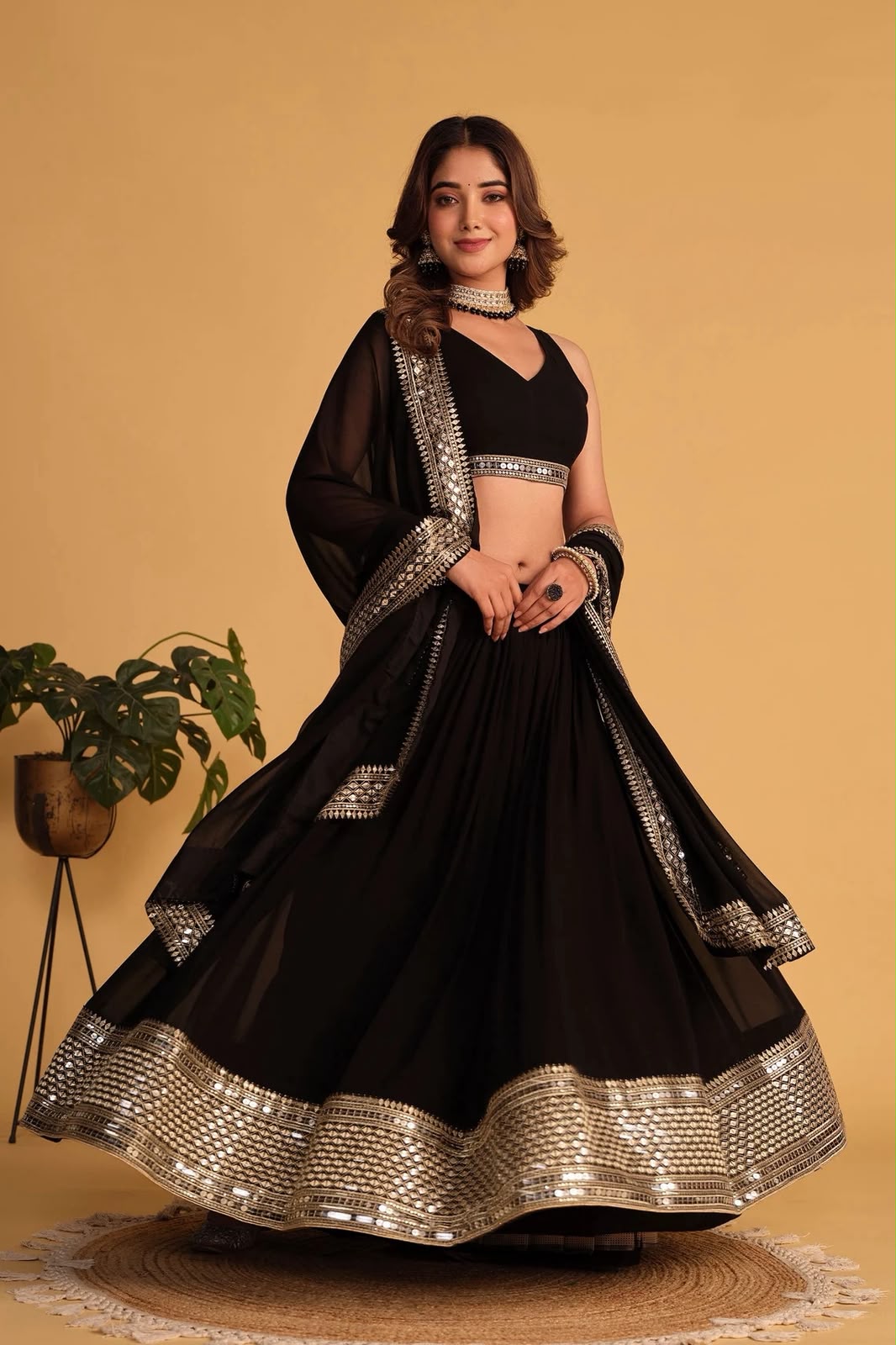 Women's Lehenga Choli Set in Rani Pink & Black Faux Blooming Fabric with Sequin Embroidery