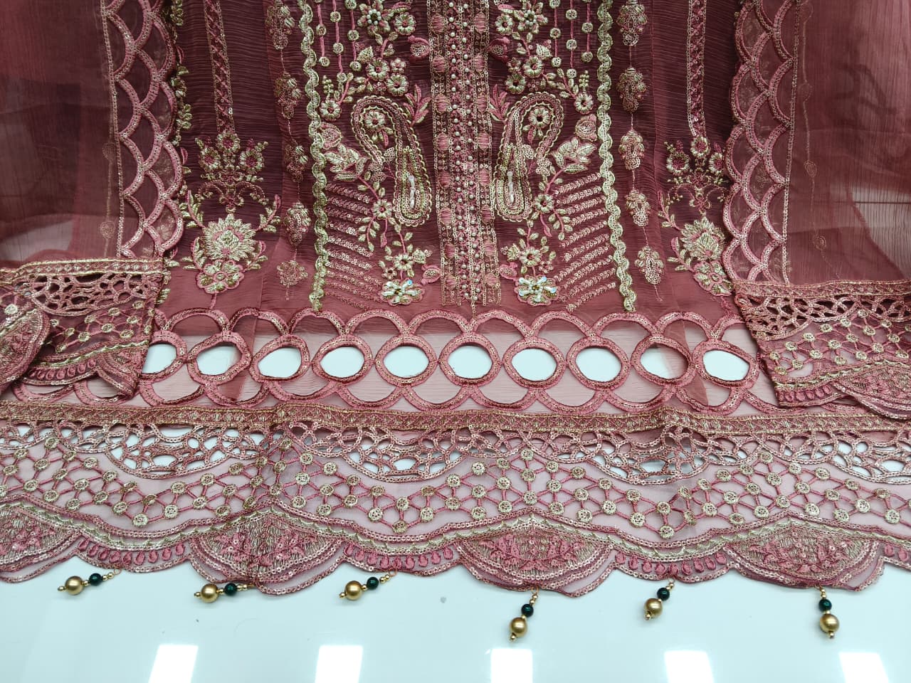 Designer stylish suit crafted in IMP CRYSTAL CHIFFON with elegant embroidery and pure handwork.