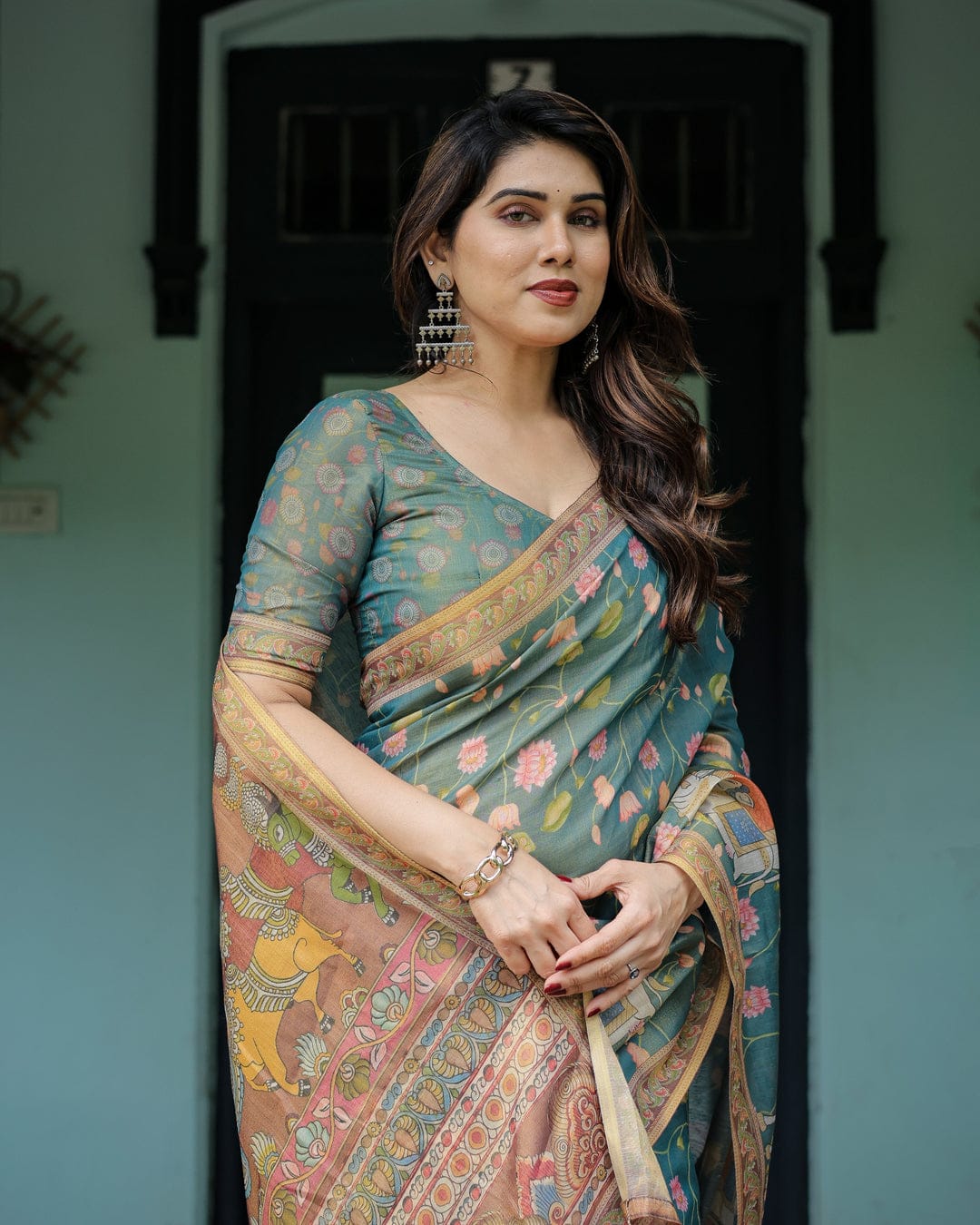 Elegant Teal Blue Floral Kalamkari Silk-Blend Saree with Heritage Borders