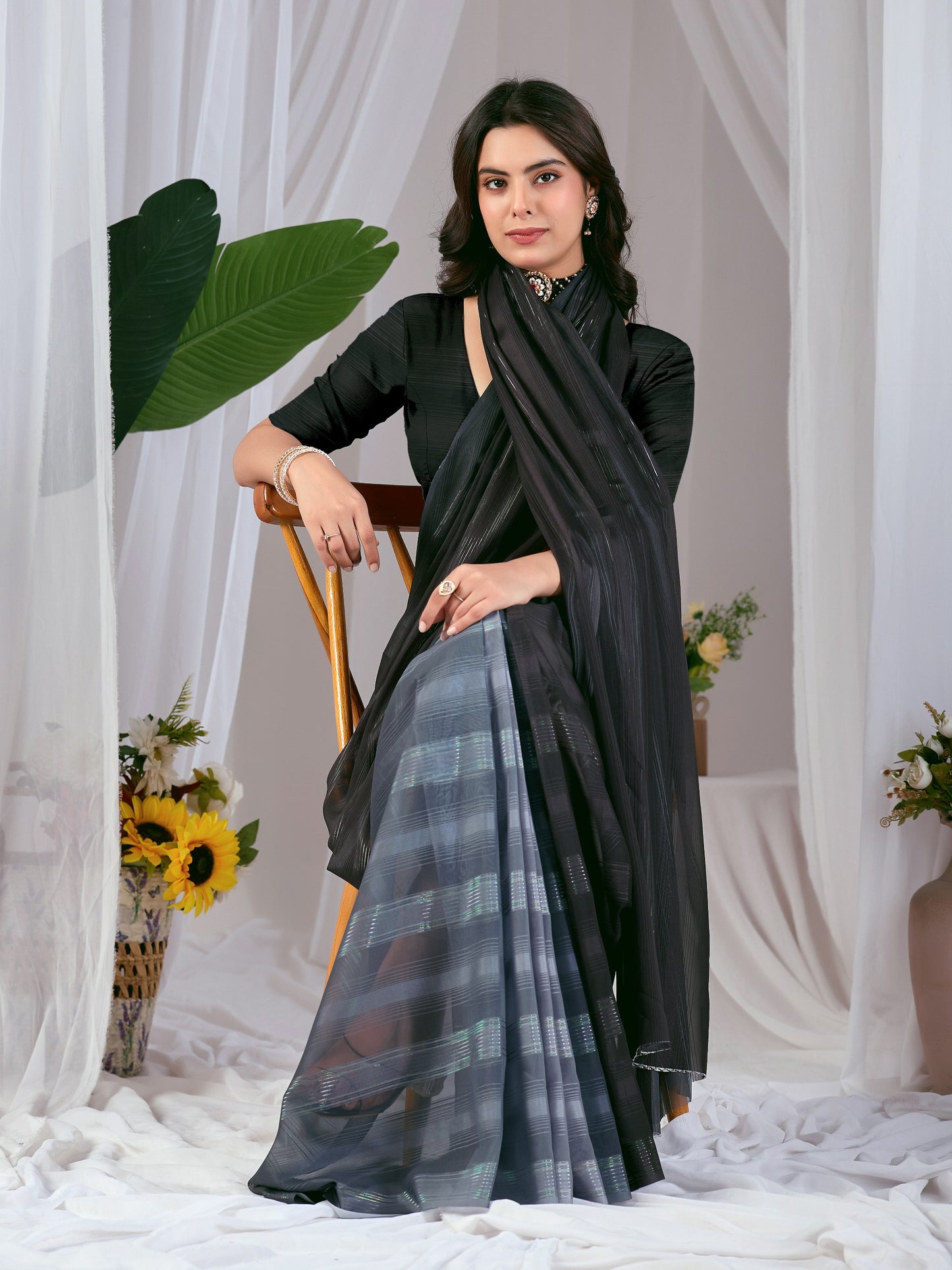 Premium Monsoon Saree featuring a classy ombré blend of deep black and smoky grey tones with a silky smooth flow of saree