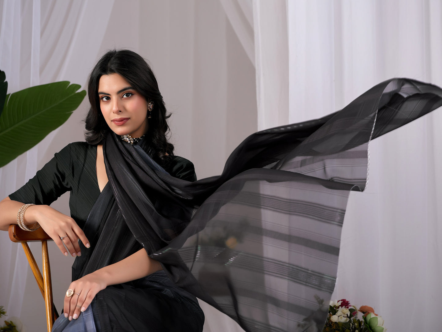 Premium Monsoon Saree featuring a classy ombré blend of deep black and smoky grey tones with a silky smooth flow of saree