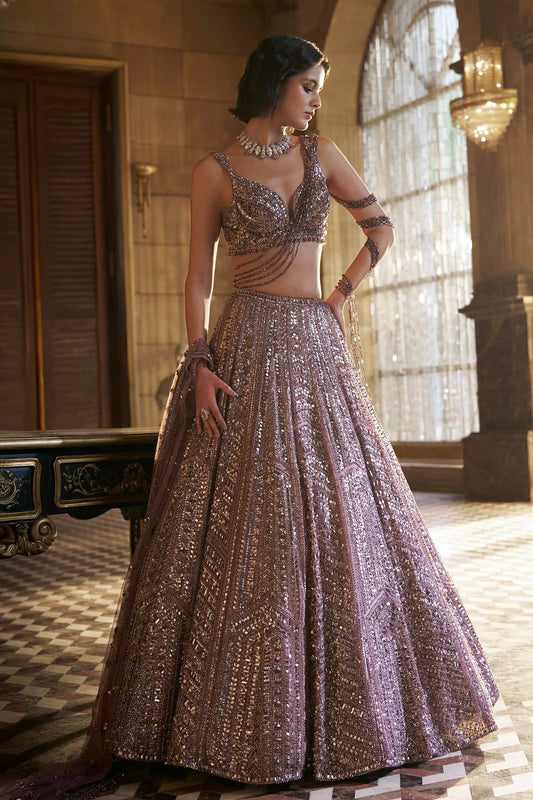 Where the softest mauve lehenga meets the boldest sparkle