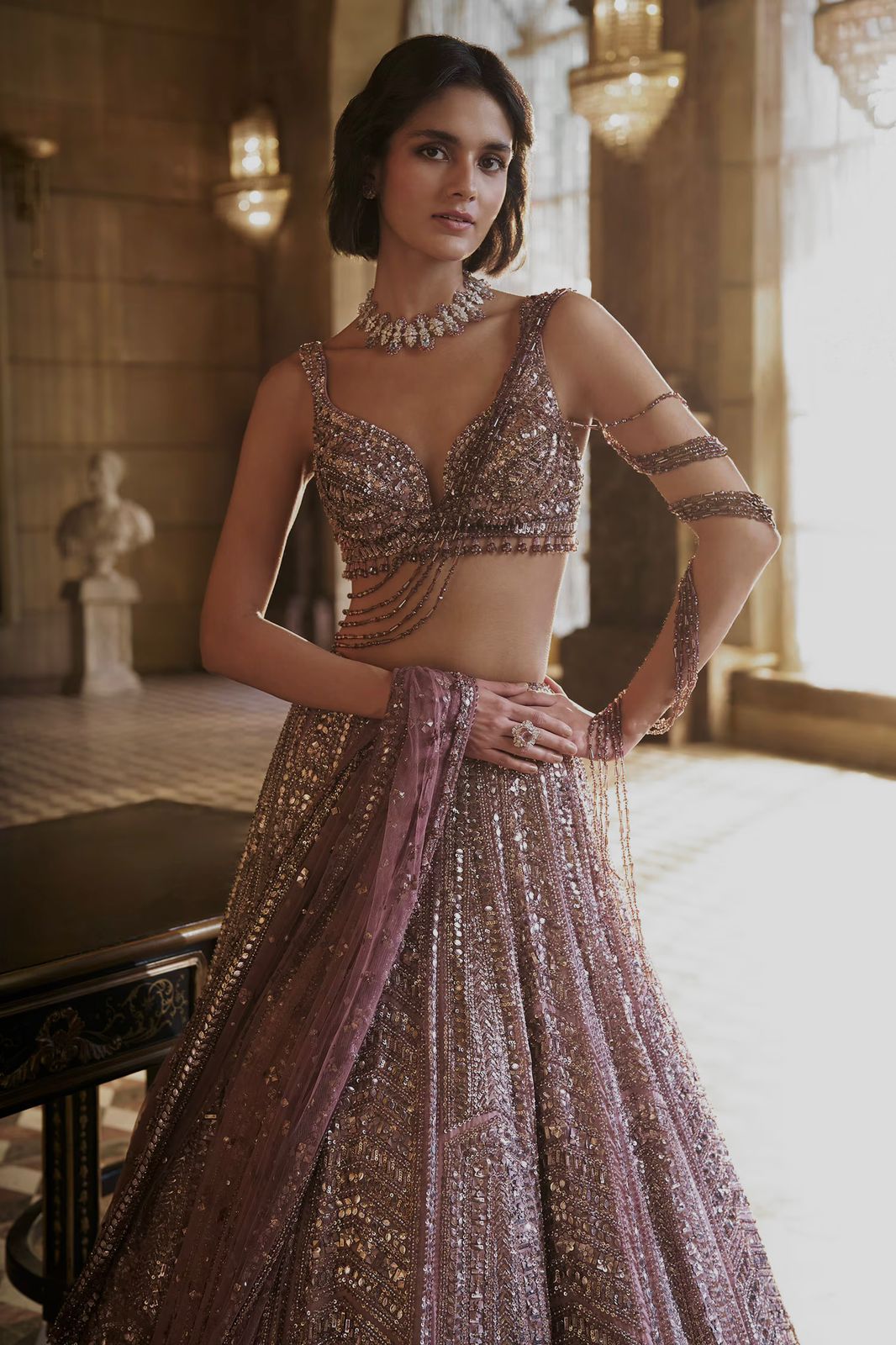 Where the softest mauve lehenga meets the boldest sparkle