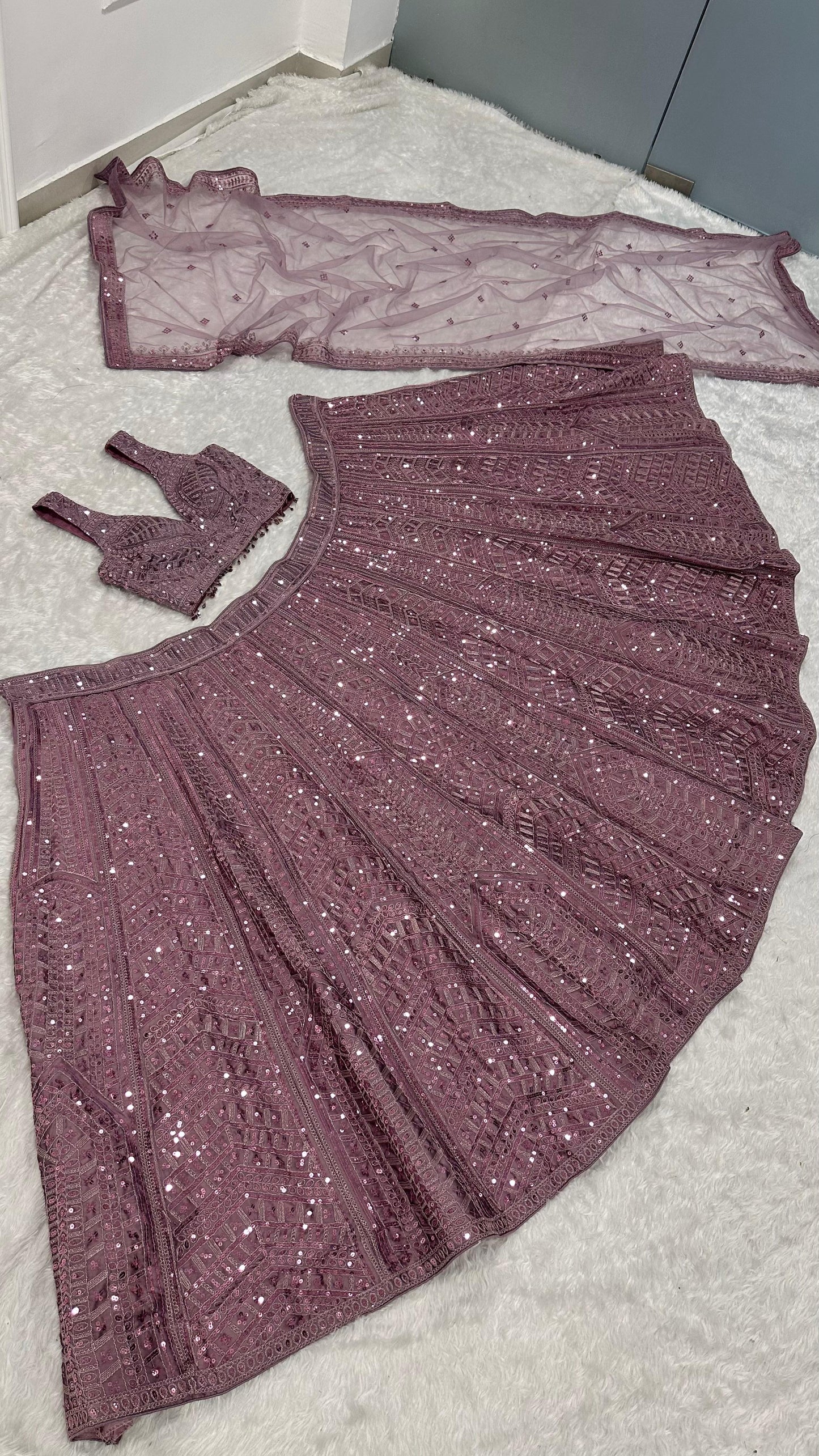 Where the softest mauve lehenga meets the boldest sparkle