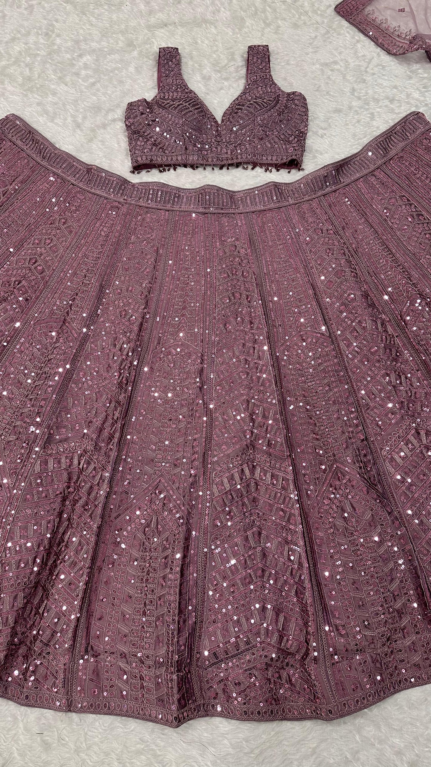 Where the softest mauve lehenga meets the boldest sparkle