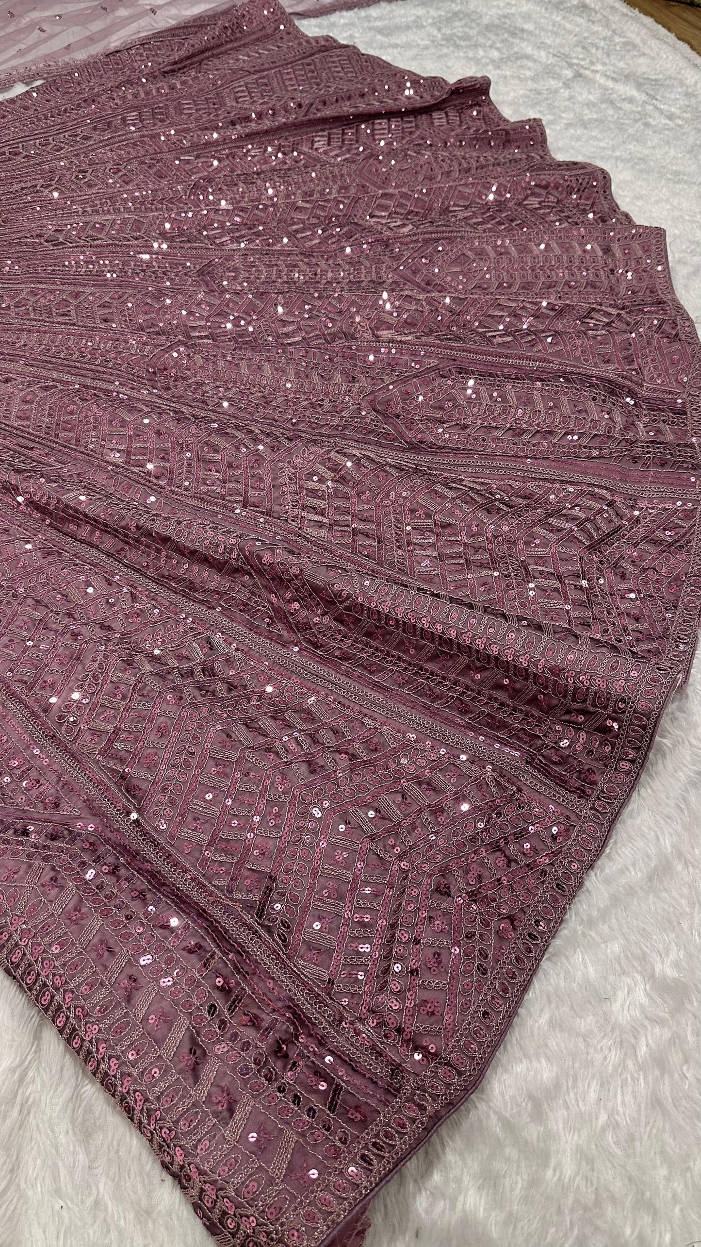 Where the softest mauve lehenga meets the boldest sparkle