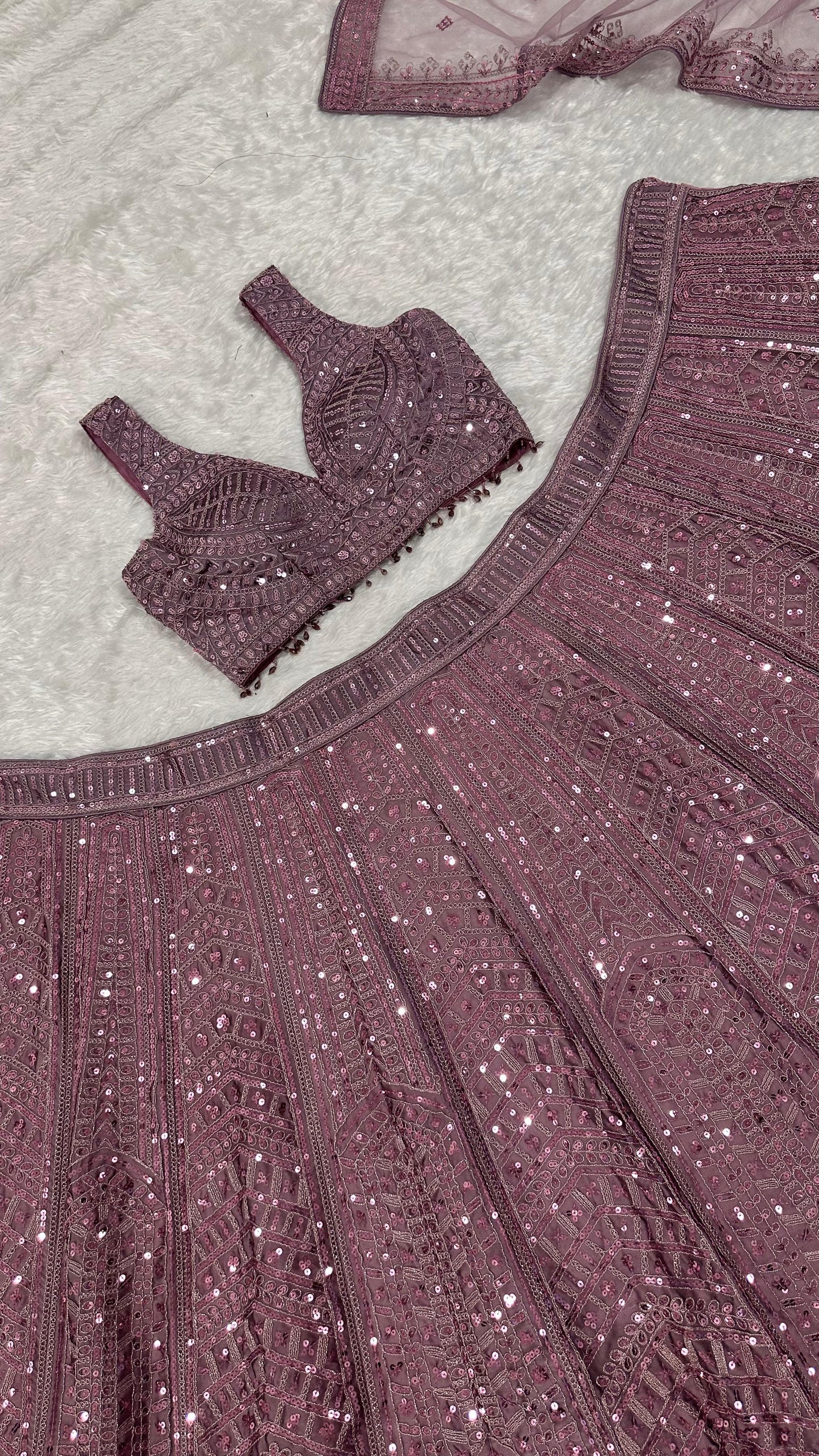 Where the softest mauve lehenga meets the boldest sparkle