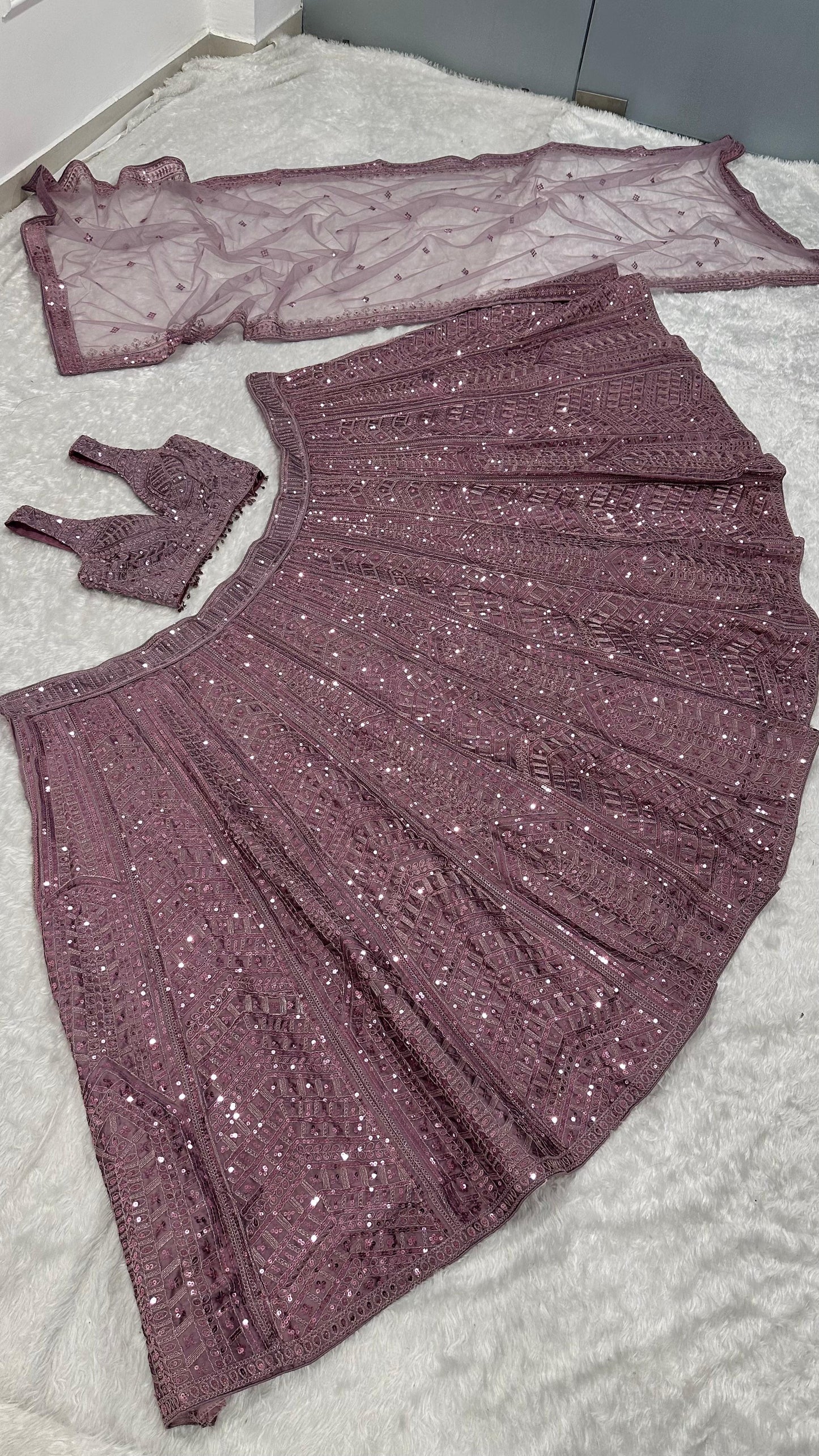Where the softest mauve lehenga meets the boldest sparkle