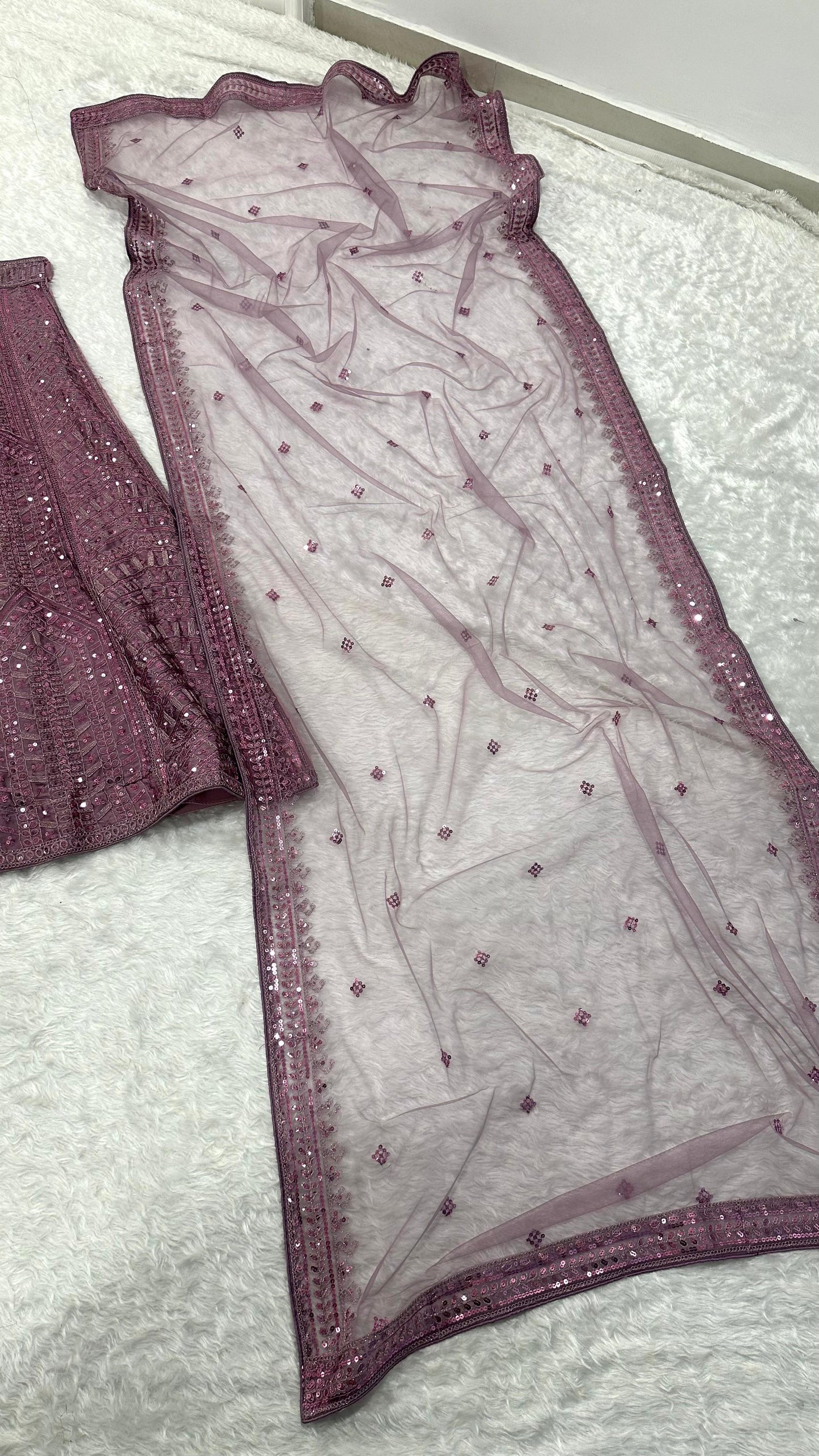 Where the softest mauve lehenga meets the boldest sparkle