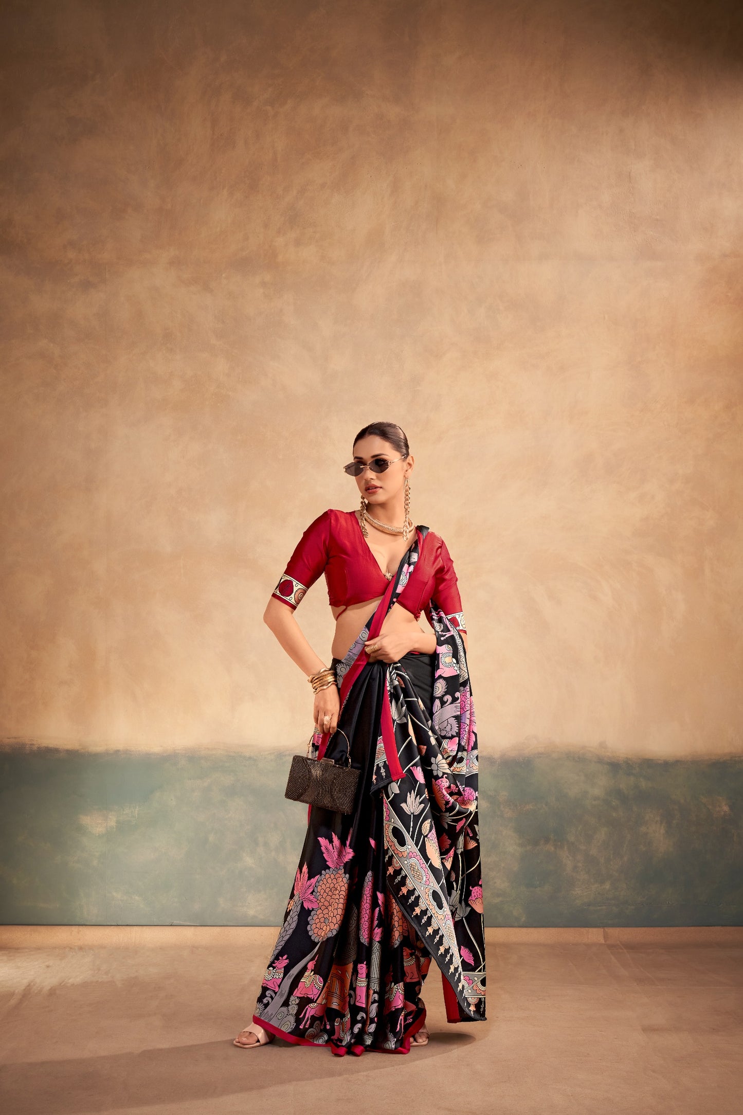 The beauty of Kalamkari art paired with the softness of satin silk creates a saree that feels luxurious, graceful, and timeless.