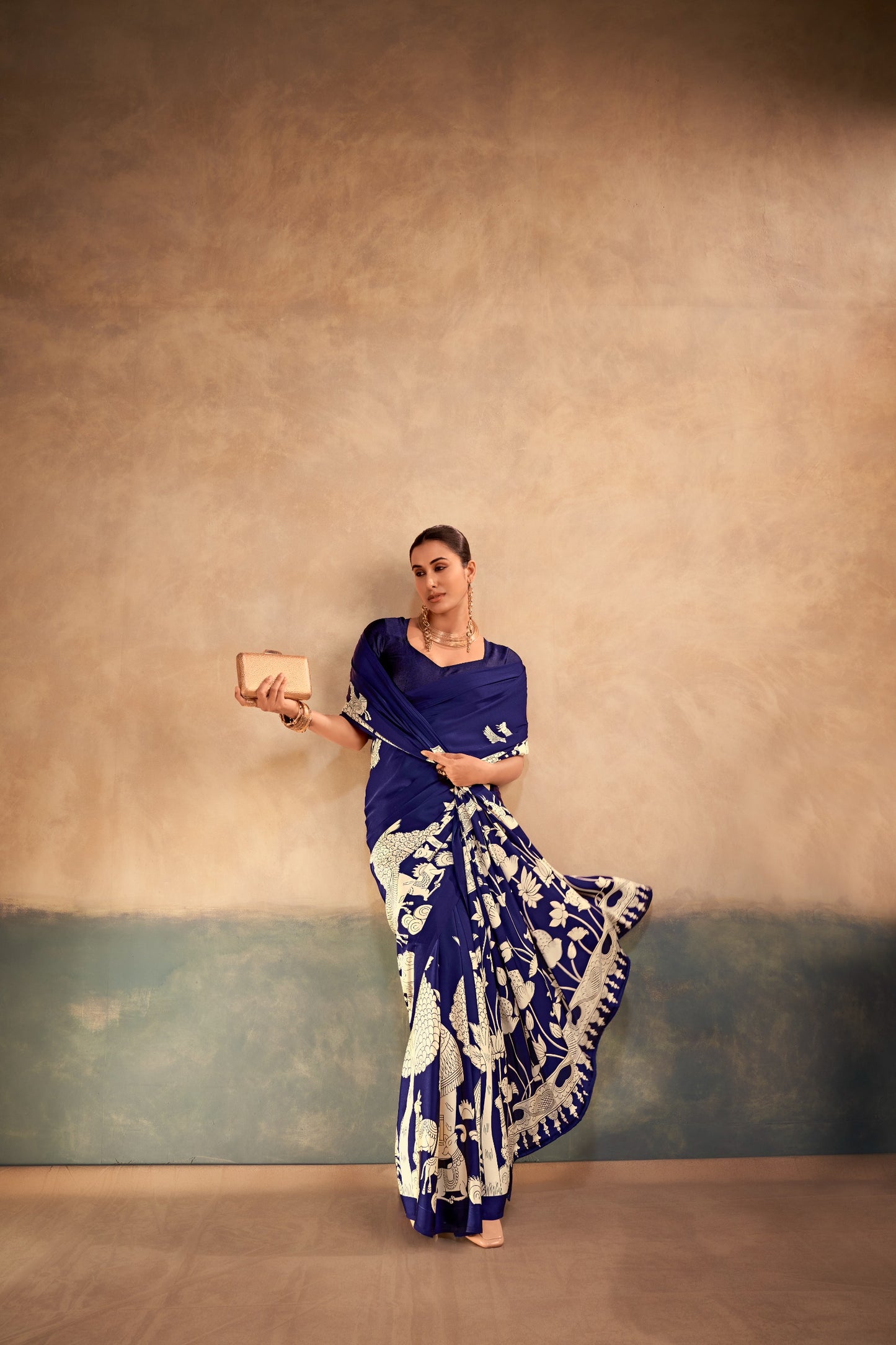 The beauty of Kalamkari art paired with the softness of satin silk creates a saree that feels luxurious, graceful, and timeless.