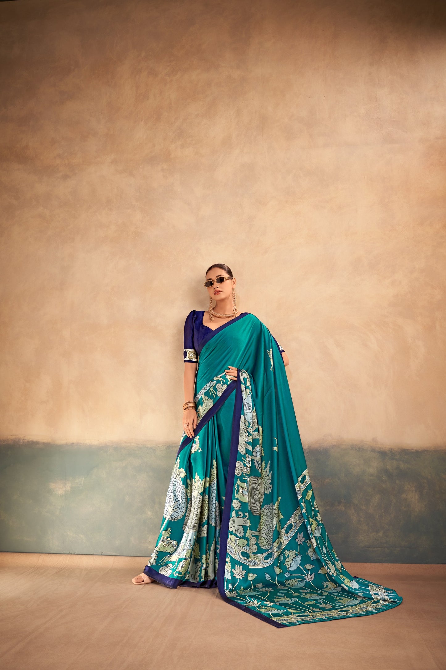 The beauty of Kalamkari art paired with the softness of satin silk creates a saree that feels luxurious, graceful, and timeless.