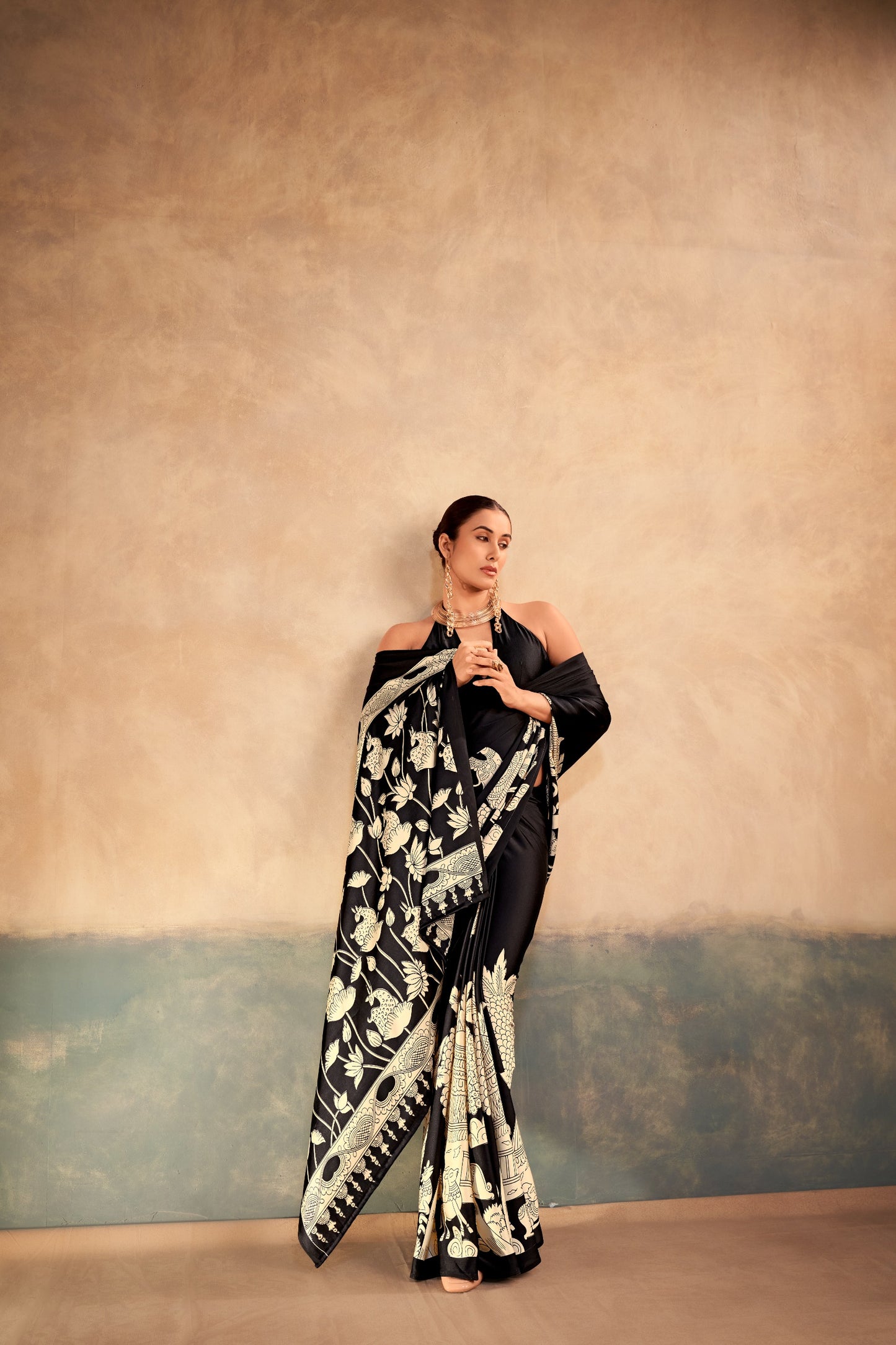 The beauty of Kalamkari art paired with the softness of satin silk creates a saree that feels luxurious, graceful, and timeless.