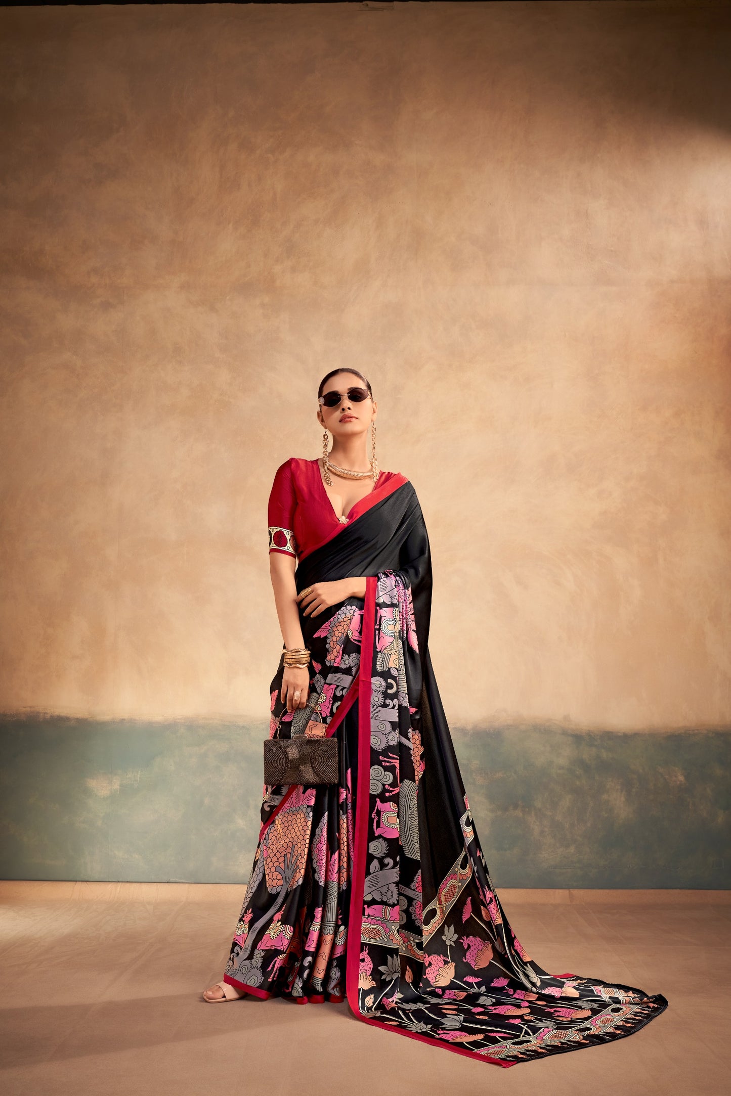 The beauty of Kalamkari art paired with the softness of satin silk creates a saree that feels luxurious, graceful, and timeless.