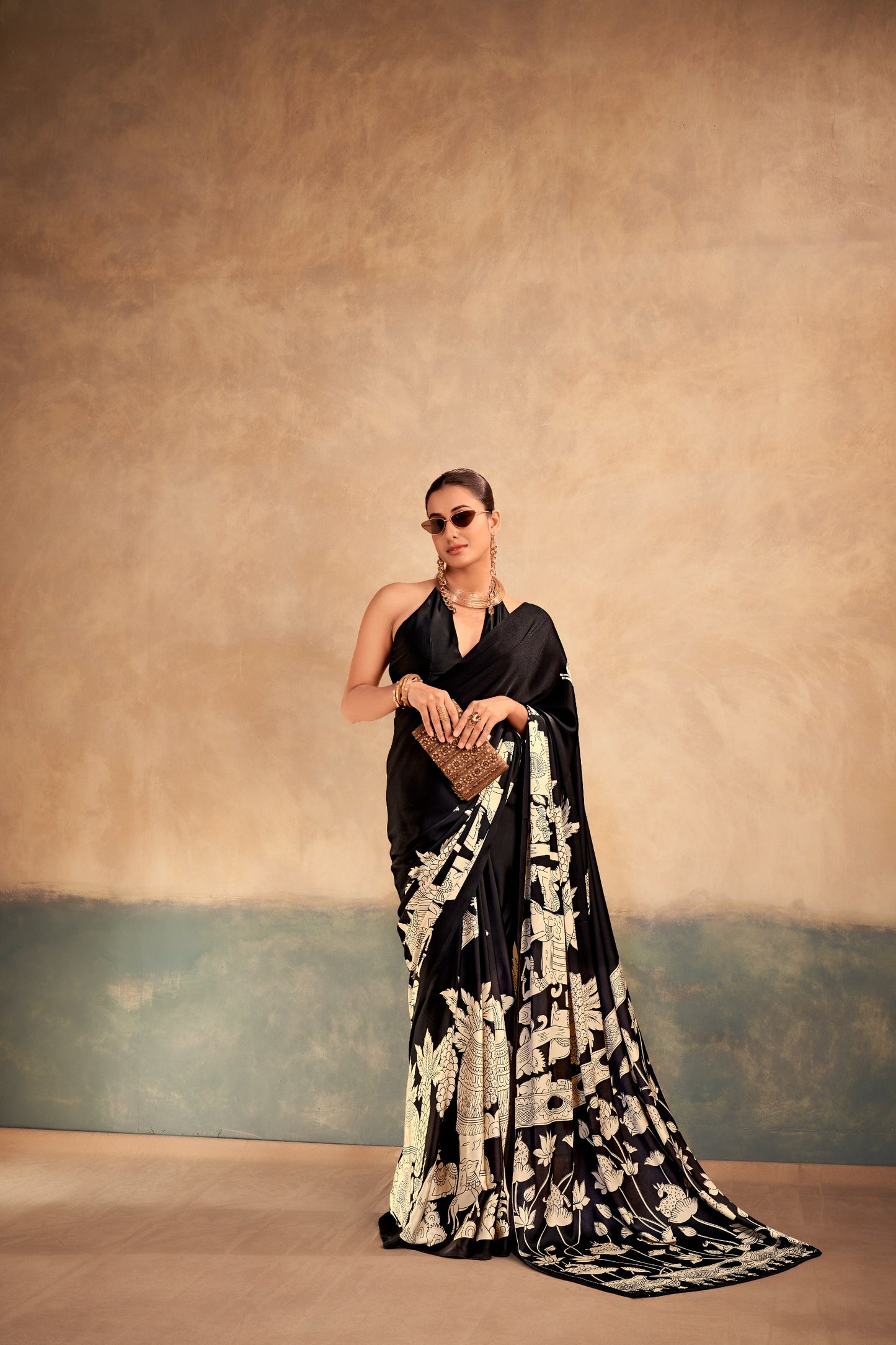 The beauty of Kalamkari art paired with the softness of satin silk creates a saree that feels luxurious, graceful, and timeless.