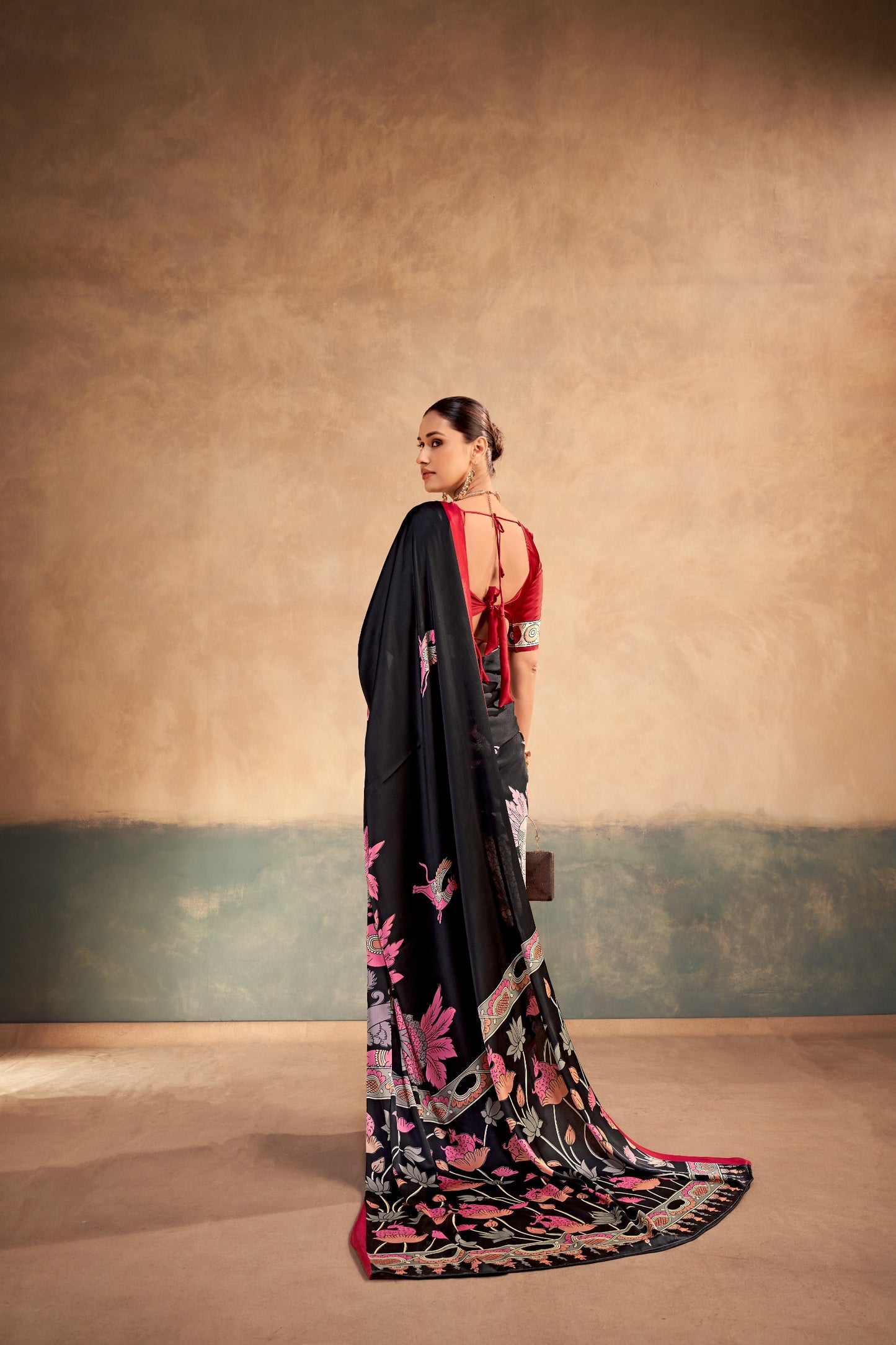 The beauty of Kalamkari art paired with the softness of satin silk creates a saree that feels luxurious, graceful, and timeless.