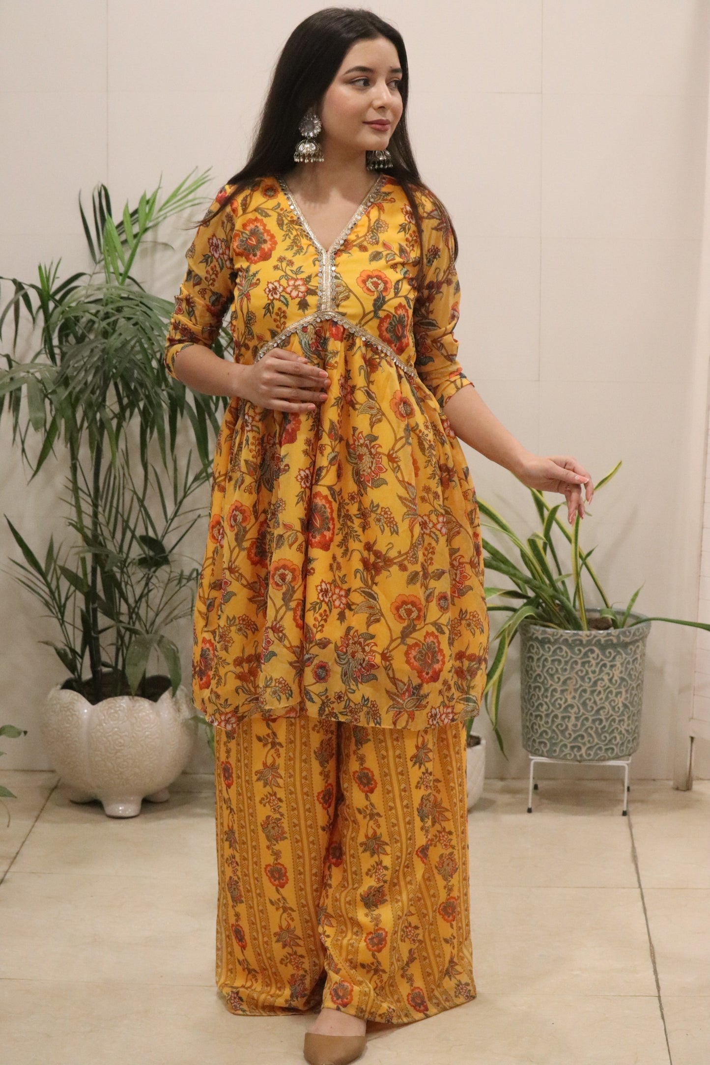 A beautiful Digital printed pure Organza silk flared kurti in a rich mustard yellow tone, adorned with all-over traditional floral prints.