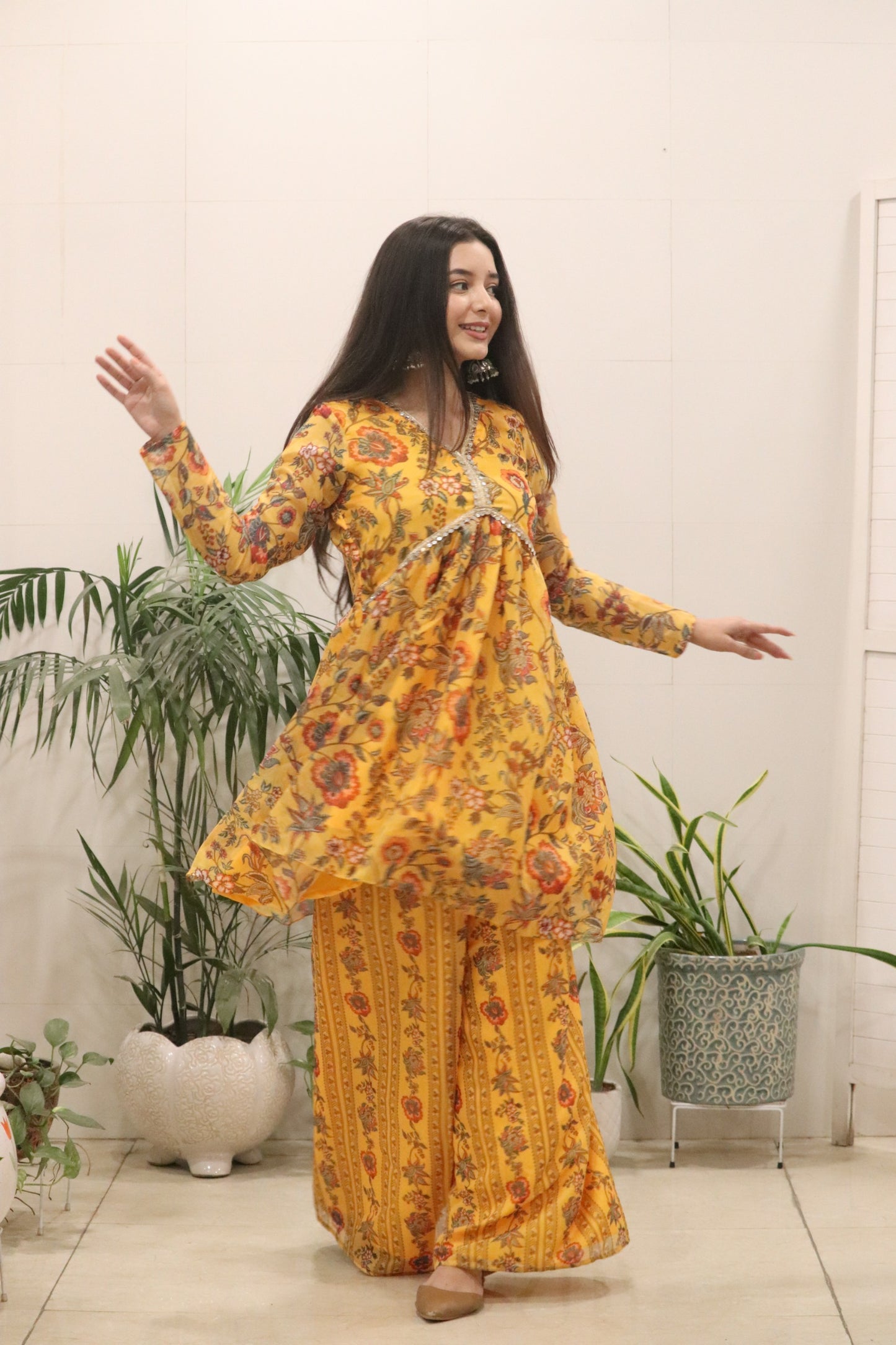 A beautiful Digital printed pure Organza silk flared kurti in a rich mustard yellow tone, adorned with all-over traditional floral prints.