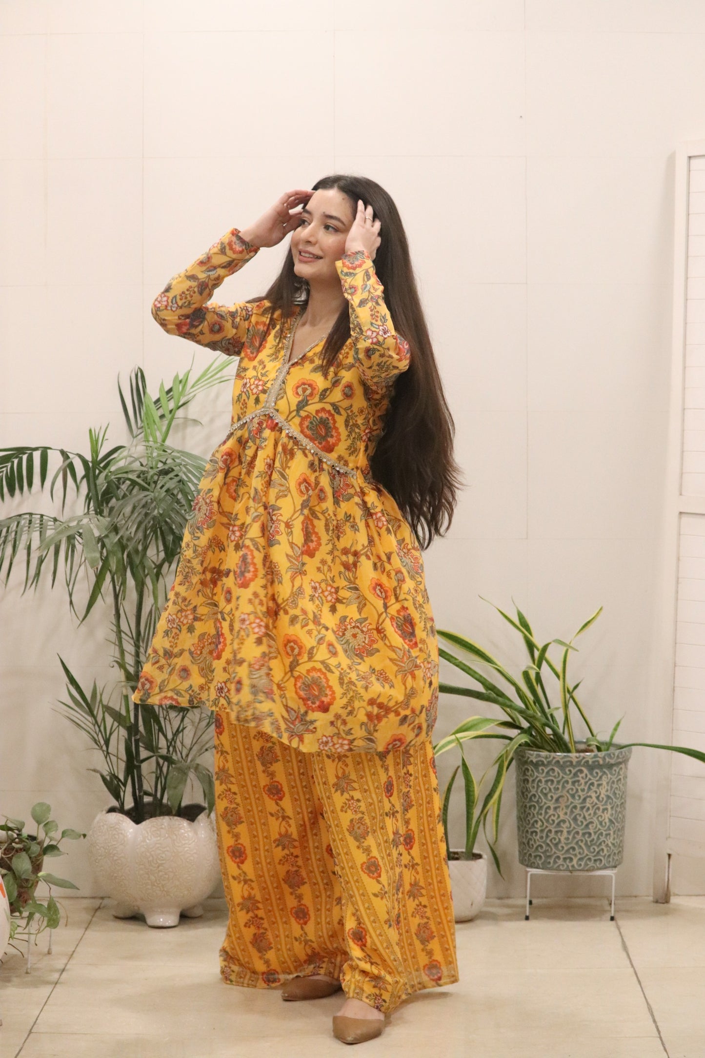 A beautiful Digital printed pure Organza silk flared kurti in a rich mustard yellow tone, adorned with all-over traditional floral prints.