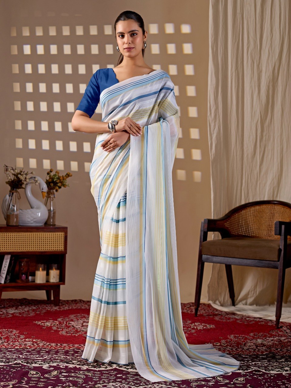 Premium Monsoon Saree featuring a soothing white base enhanced with elegant blue and yellow stripe patterns of saree