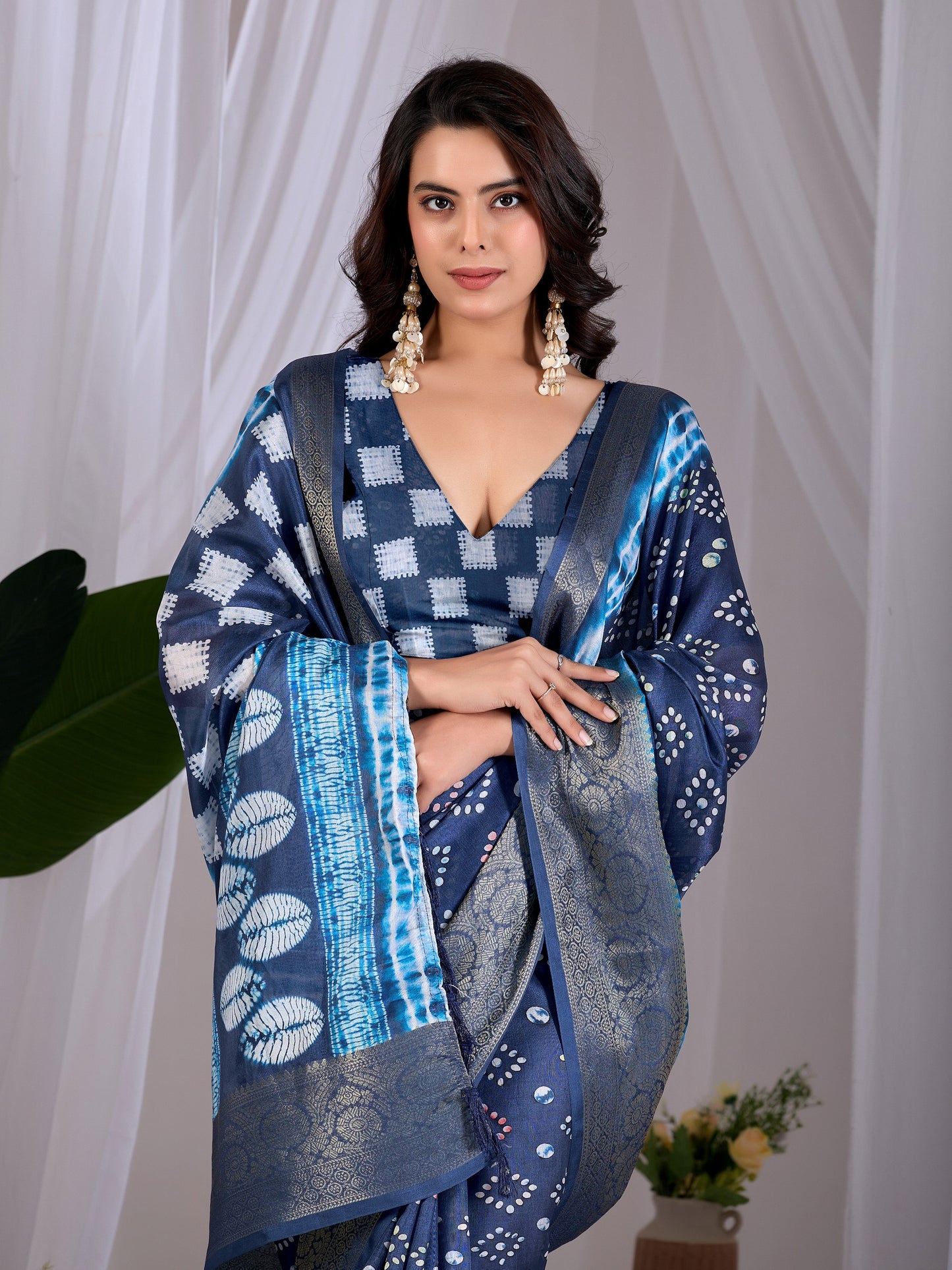 Soft Lichi Silk Saree with stylish bandhani-inspired dot patterns in rich navy blue shades and a woven border