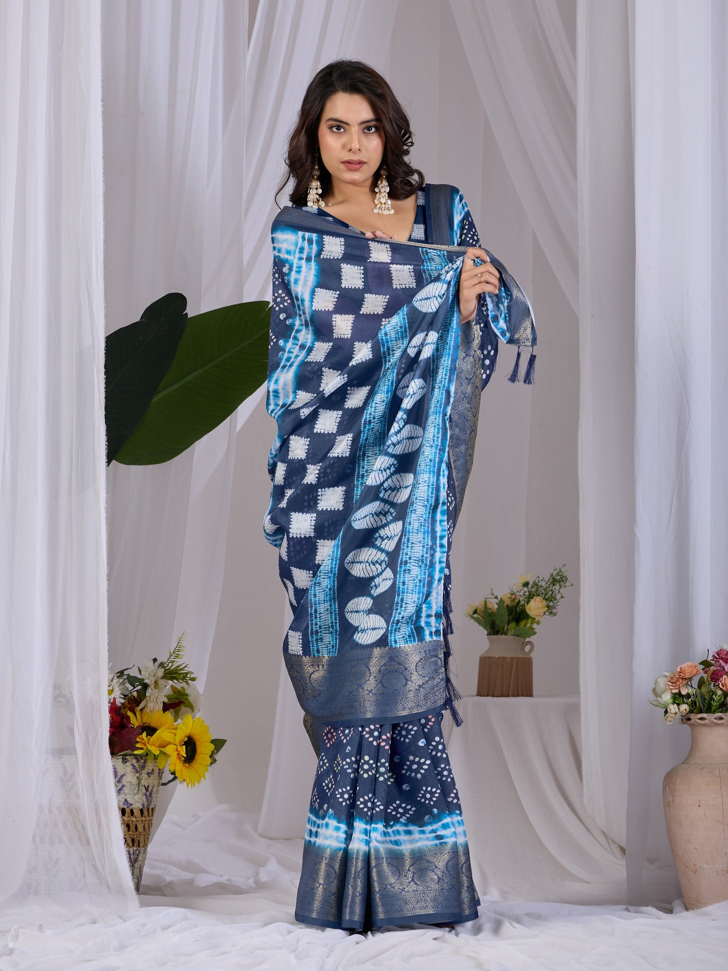 Soft Lichi Silk Saree with stylish bandhani-inspired dot patterns in rich navy blue shades and a woven border