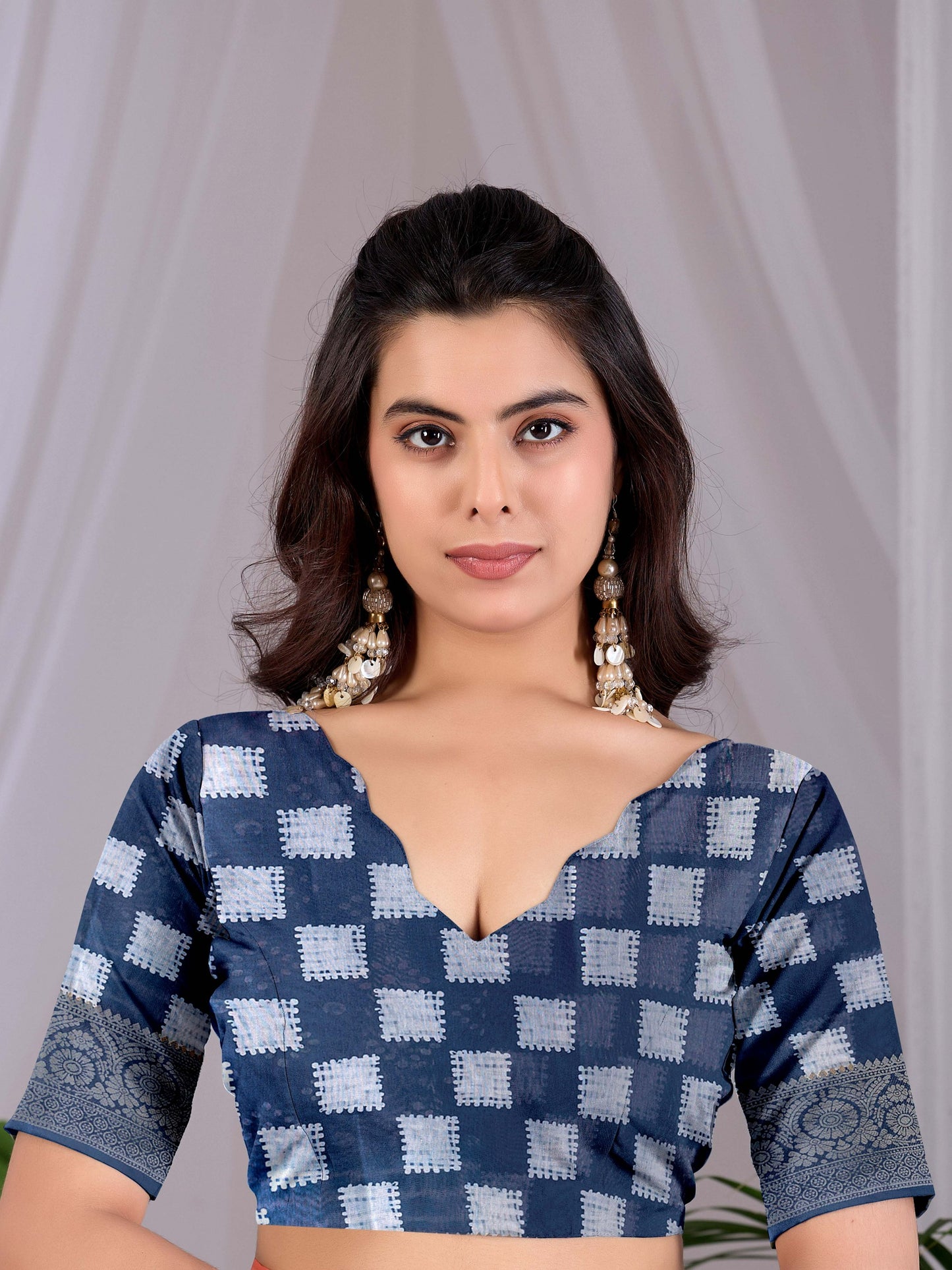 Soft Lichi Silk Saree with stylish bandhani-inspired dot patterns in rich navy blue shades and a woven border