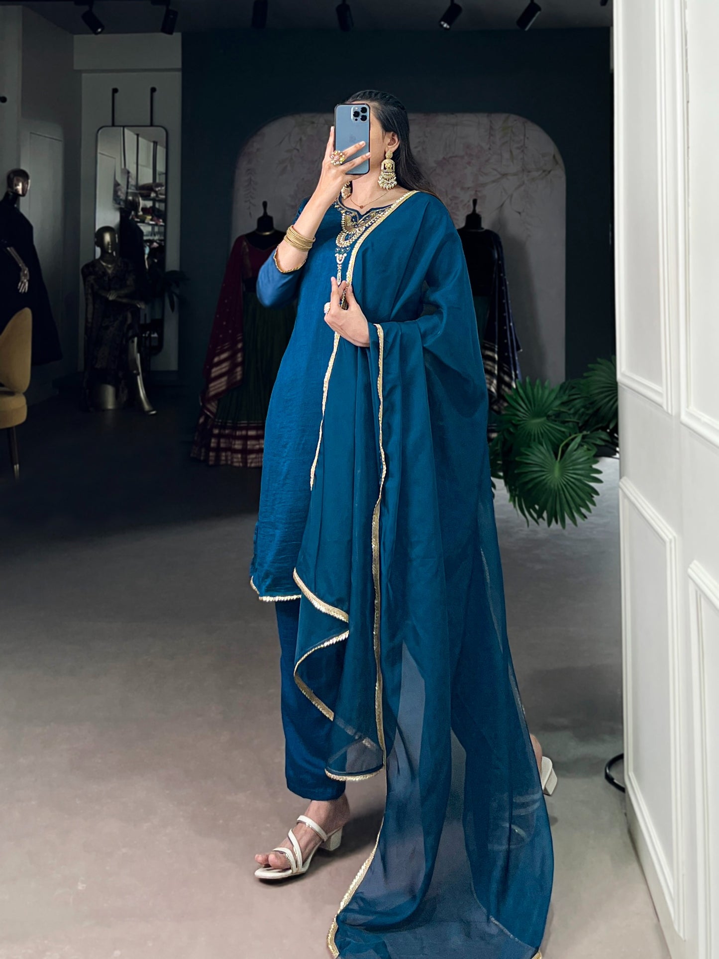 Draped in teal, dipped in grace and tradition