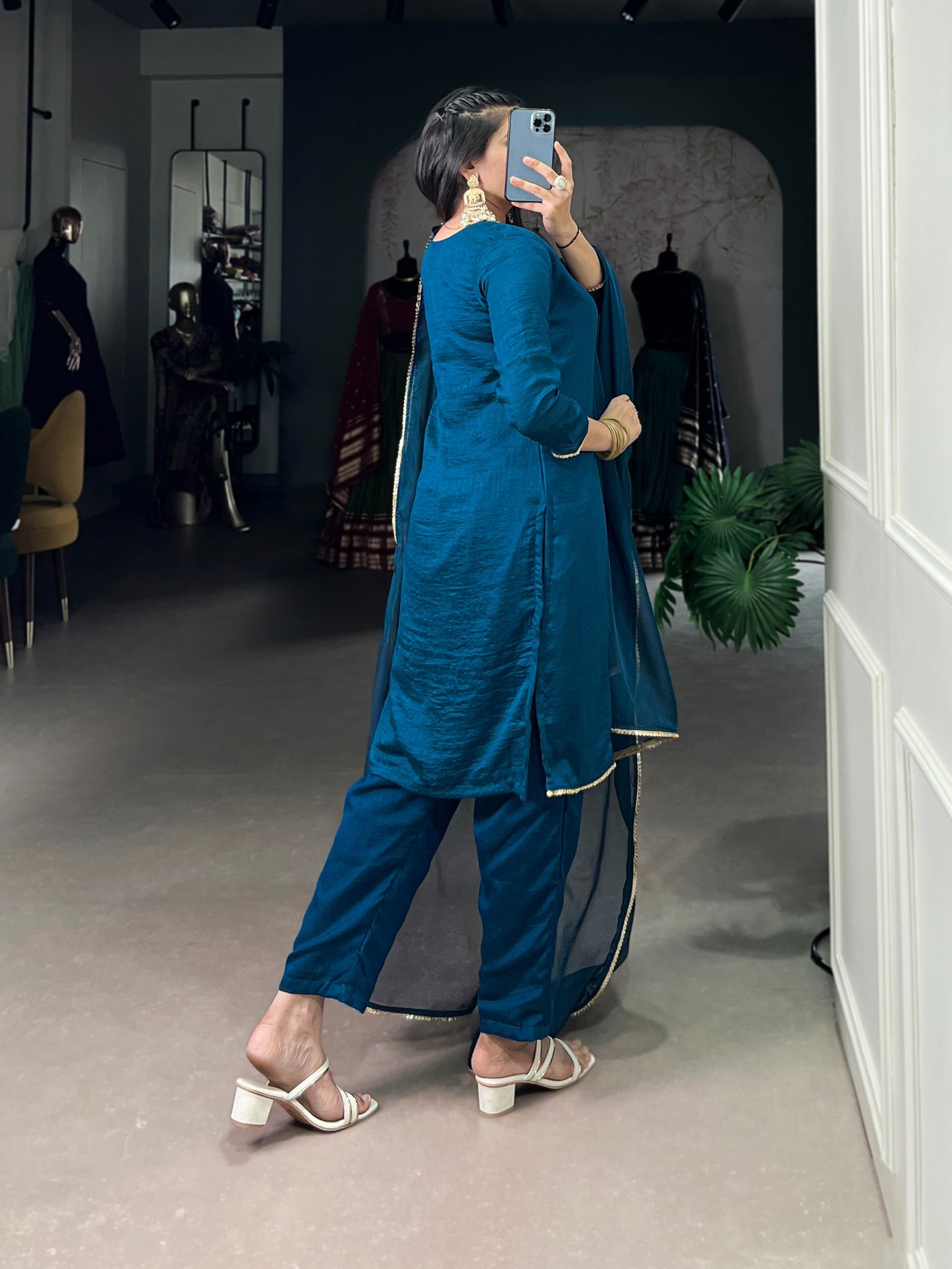 Draped in teal, dipped in grace and tradition