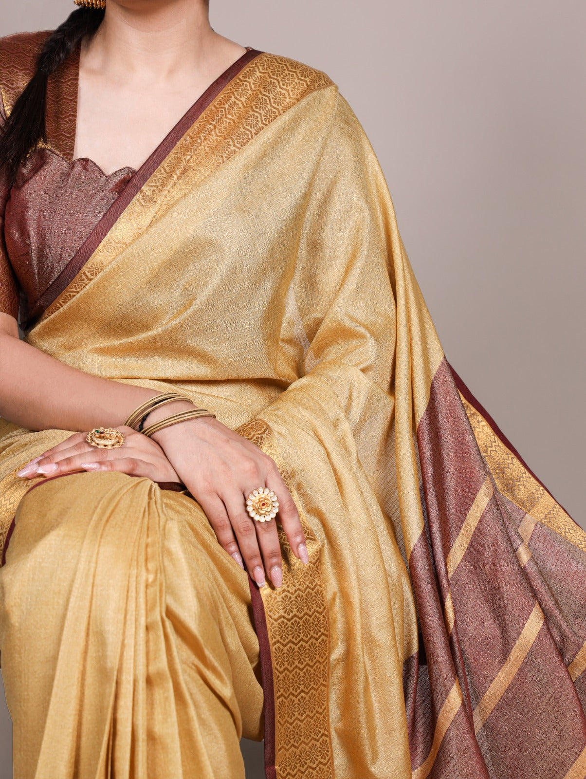 A timeless saree crafted with rich nylon dola silk and detailed zari weaving borders—designed to bring royal elegance to every occasion. 🍁