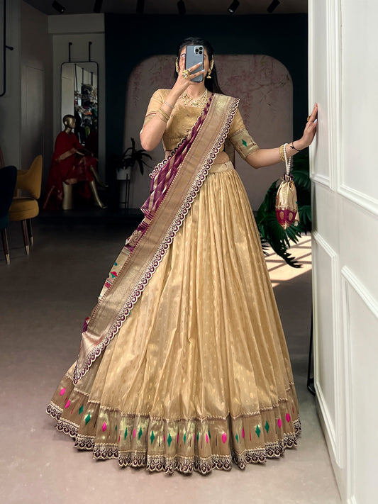 This shimmer organza lehenga choli adorned with zari weaving and delicate lace borders brings timeless elegance to every festive moment ✨