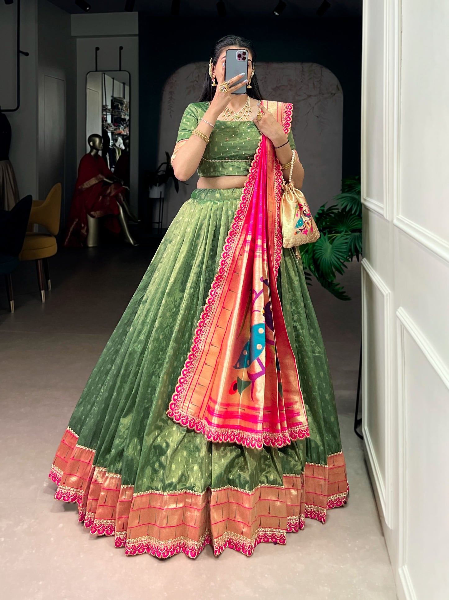 This shimmer organza lehenga choli adorned with zari weaving and delicate lace borders brings timeless elegance to every festive moment ✨