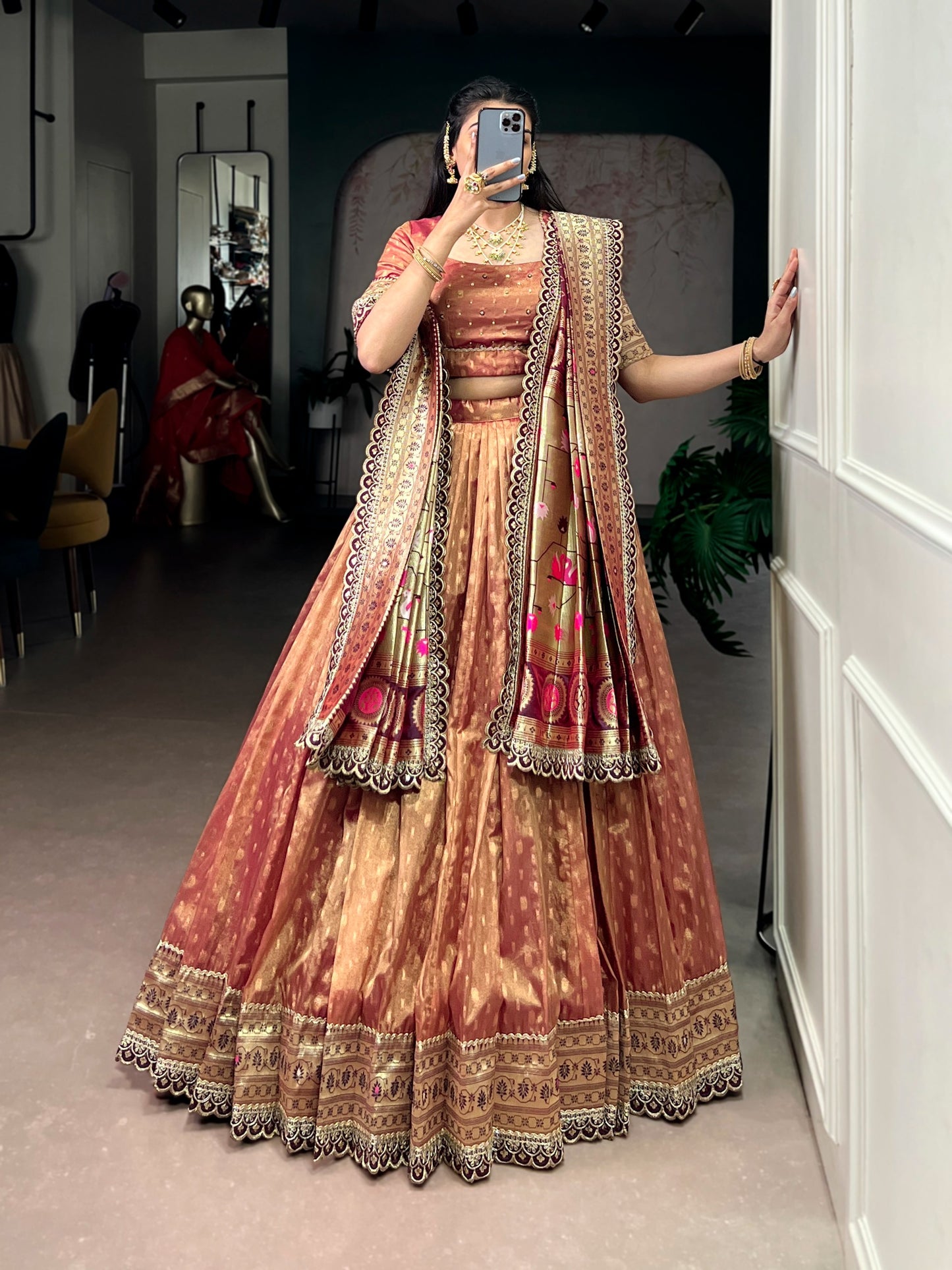 This shimmer organza lehenga choli adorned with zari weaving and delicate lace borders brings timeless elegance to every festive moment ✨