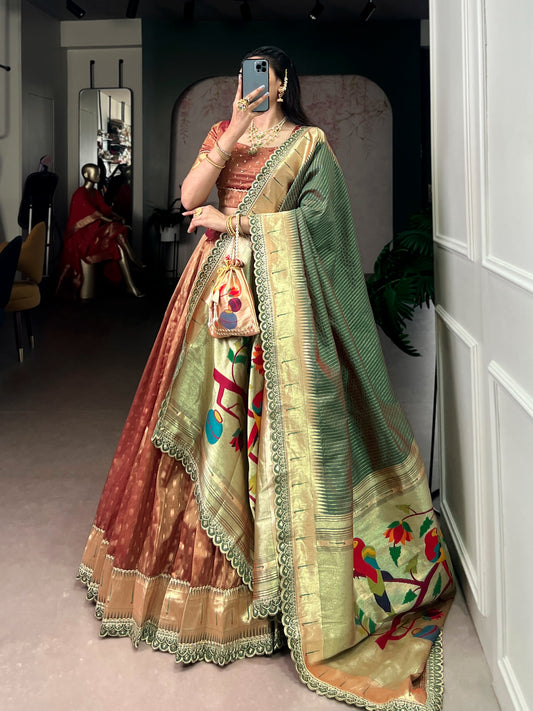 This shimmer organza lehenga choli adorned with zari weaving and delicate lace borders brings timeless elegance to every festive moment ✨
