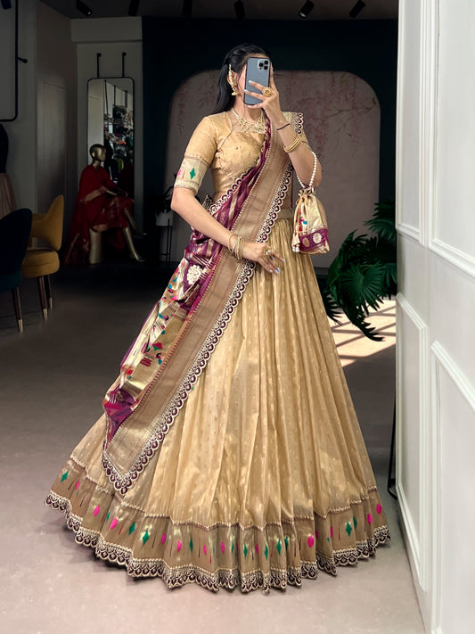 This shimmer organza lehenga choli adorned with zari weaving and delicate lace borders brings timeless elegance to every festive moment ✨